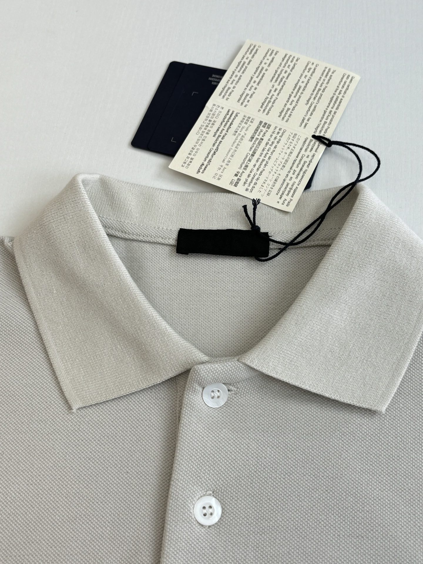 Prada Prad*/普拉达 SS26 米白徽章刺绣短袖Polo衫