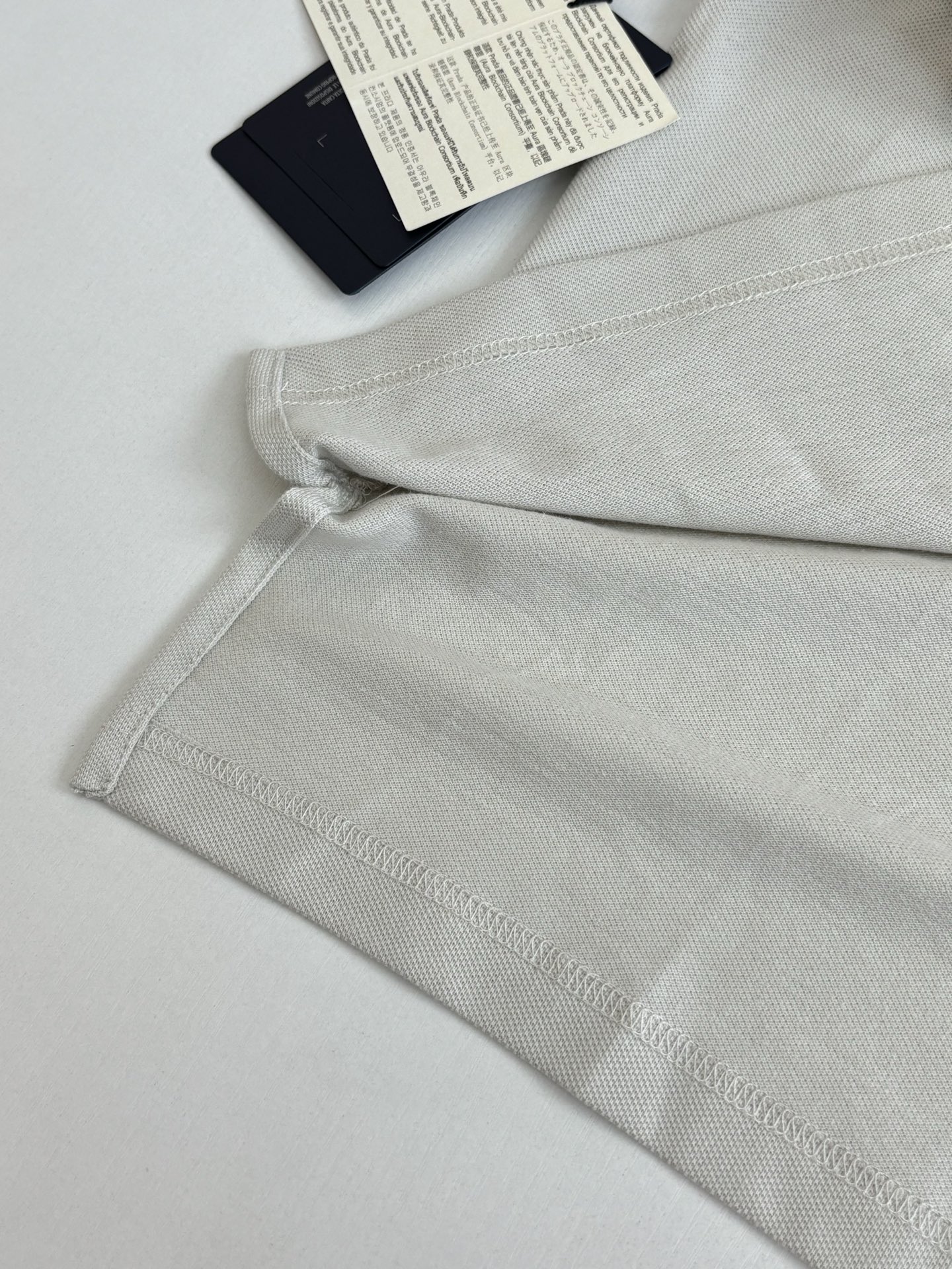 Prada Prad*/普拉达 SS26 米白徽章刺绣短袖Polo衫