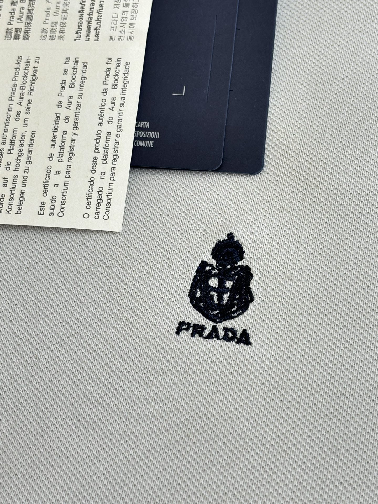 Prada Prad*/普拉达 SS26 米白徽章刺绣短袖Polo衫