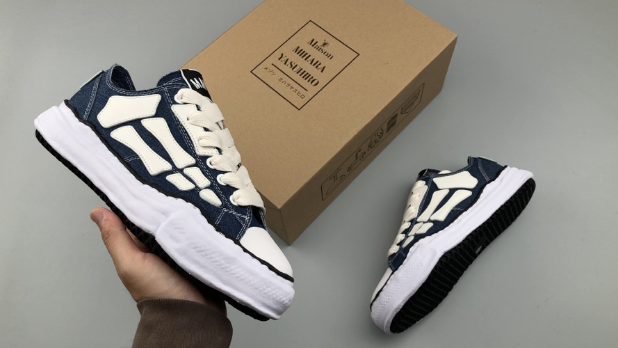 Maison Mihara Yasuhiro Low-Top Denim Sneakers with Bone Detail 1 Maison Mihara Yasuhiro Low-Top Denim Sneakers with Bone Detail