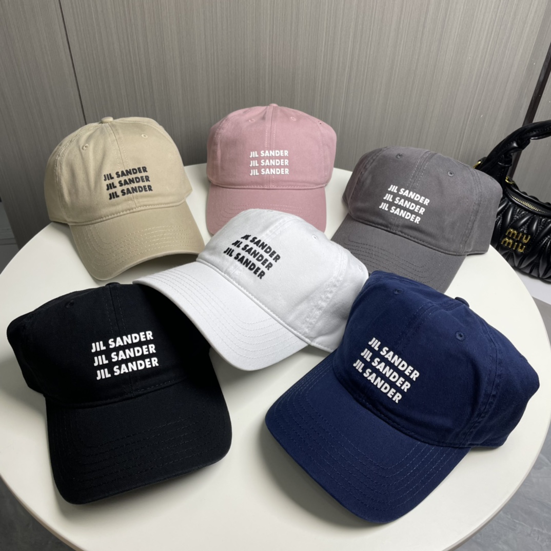 Jil Sander’s Minimalist Pure Cotton Baseball Cap with Colored Eye Detail - 图片 9