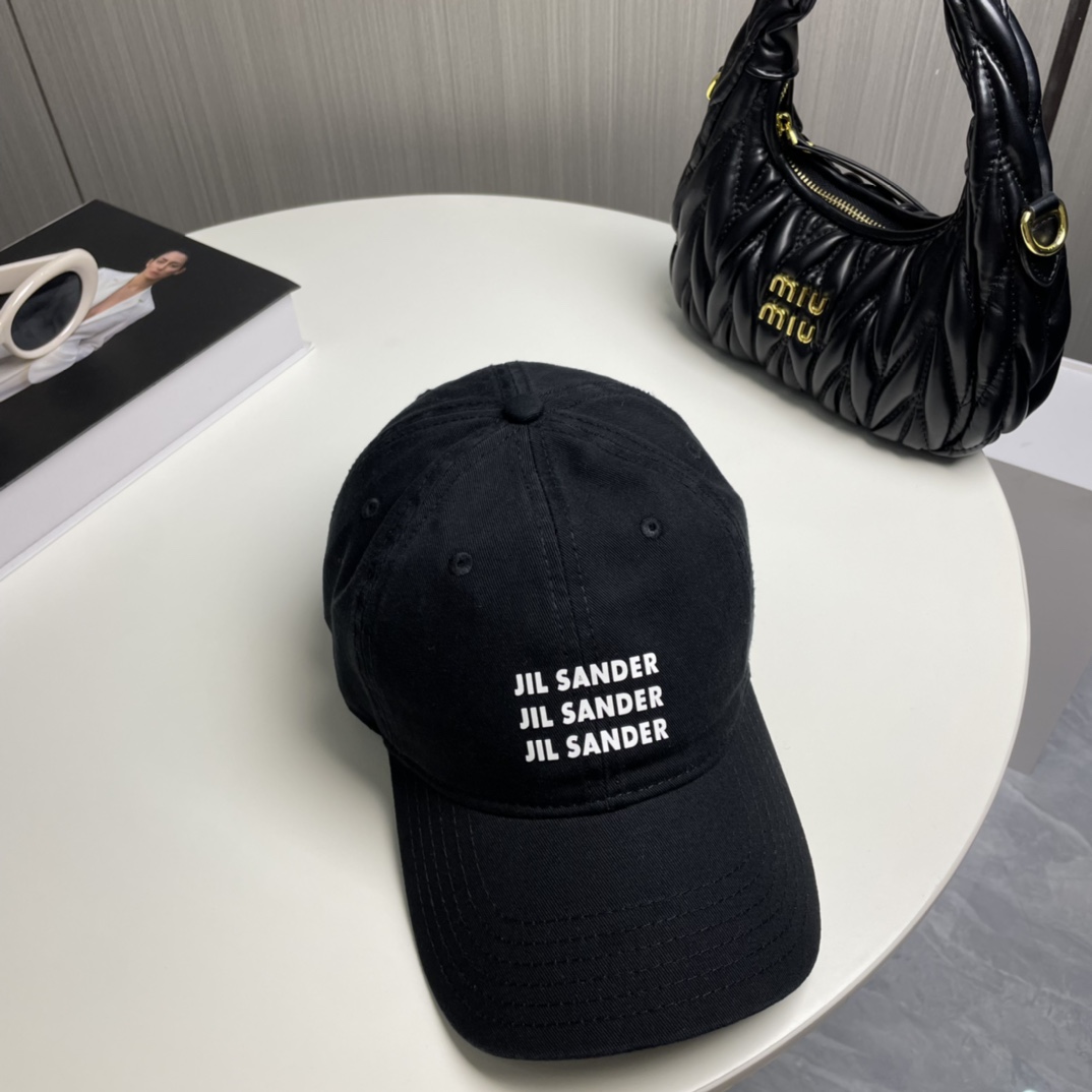 Jil Sander’s Minimalist Pure Cotton Baseball Cap with Colored Eye Detail - 图片 5