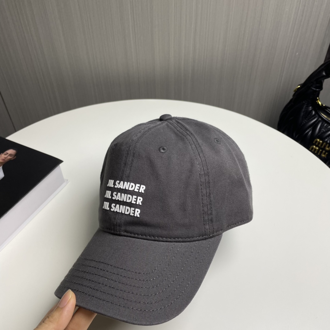 Jil Sander’s Visionary Pure Cotton Baseball Cap with Colored Eye Detail - 图片 2