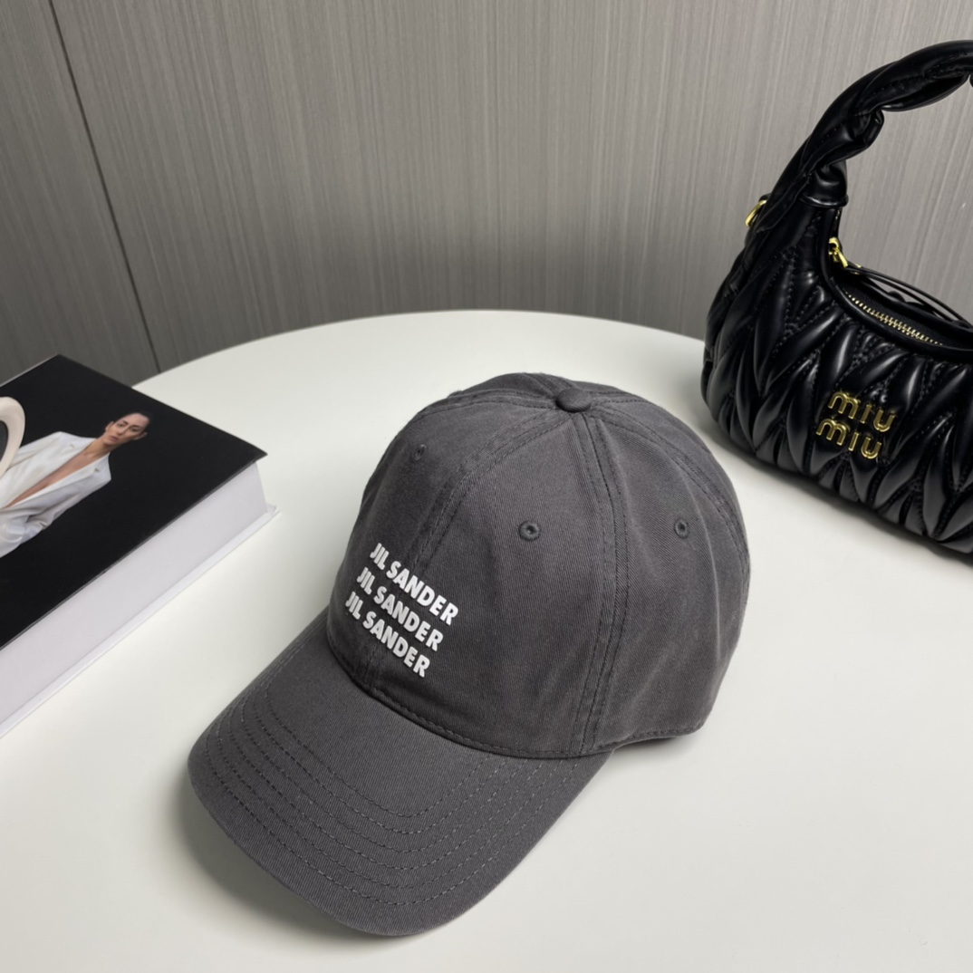 Jil Sander’s Visionary Pure Cotton Baseball Cap with Colored Eye Detail - 图片 6