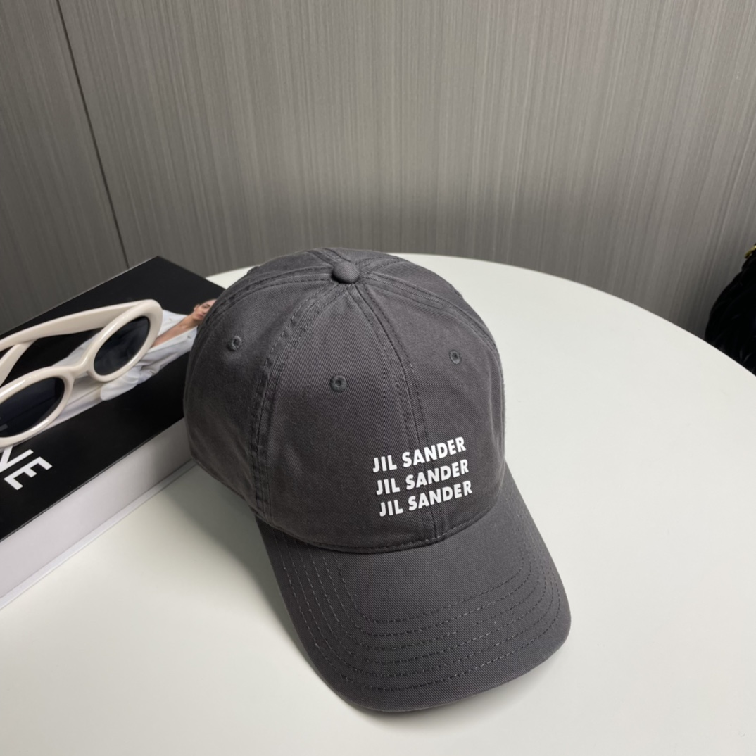 Jil Sander’s Visionary Pure Cotton Baseball Cap with Colored Eye Detail - 图片 7