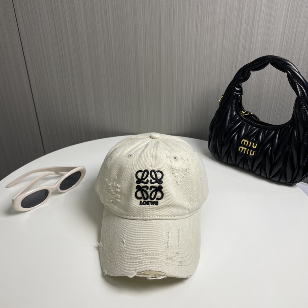 Réplica España
 Loewe Sombreros Gorras