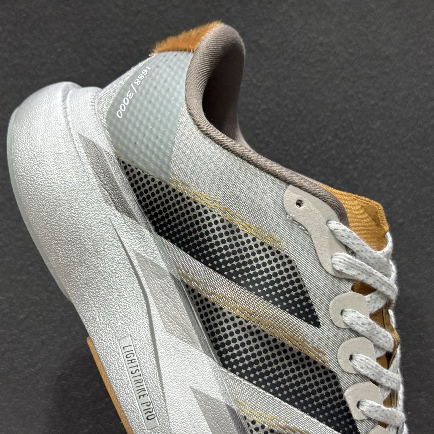 180 Ad Adizero Evo SL M 阿迪“马年限定”超轻透气缓震跑鞋 KK4310-111-Chinese UA Cheap High Quatity Brand Clothes Bags handbags Sneakers wholesale wholesaler seller from China Factory suppliers Fashion Clothing Shoes best Quality Beautiful Price 180 Ad Adizero Evo SL M 阿迪“马年限定”超轻透气缓震跑鞋 KK4310-111