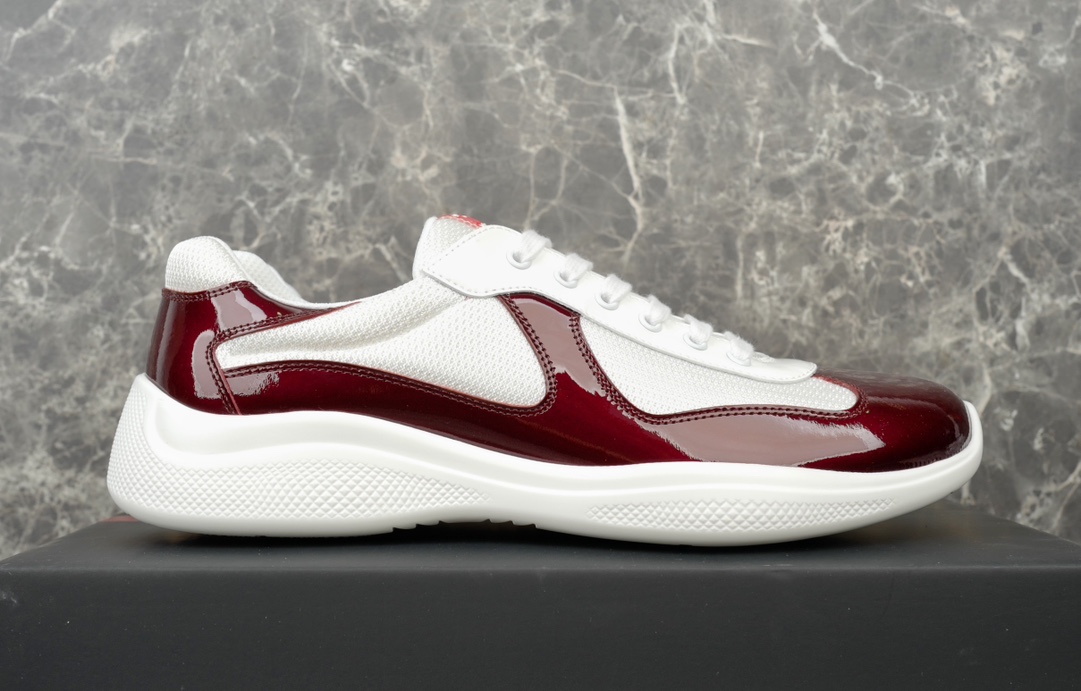 Prada America's Cup Leather-Trimmed Sneakers in Bordeaux/White 5 i1731219646 1102 1