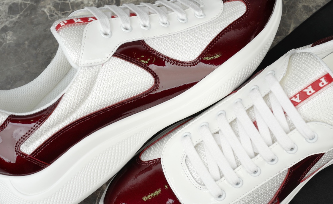 Prada America's Cup Leather-Trimmed Sneakers in Bordeaux/White 6 i1731219646 2975 3