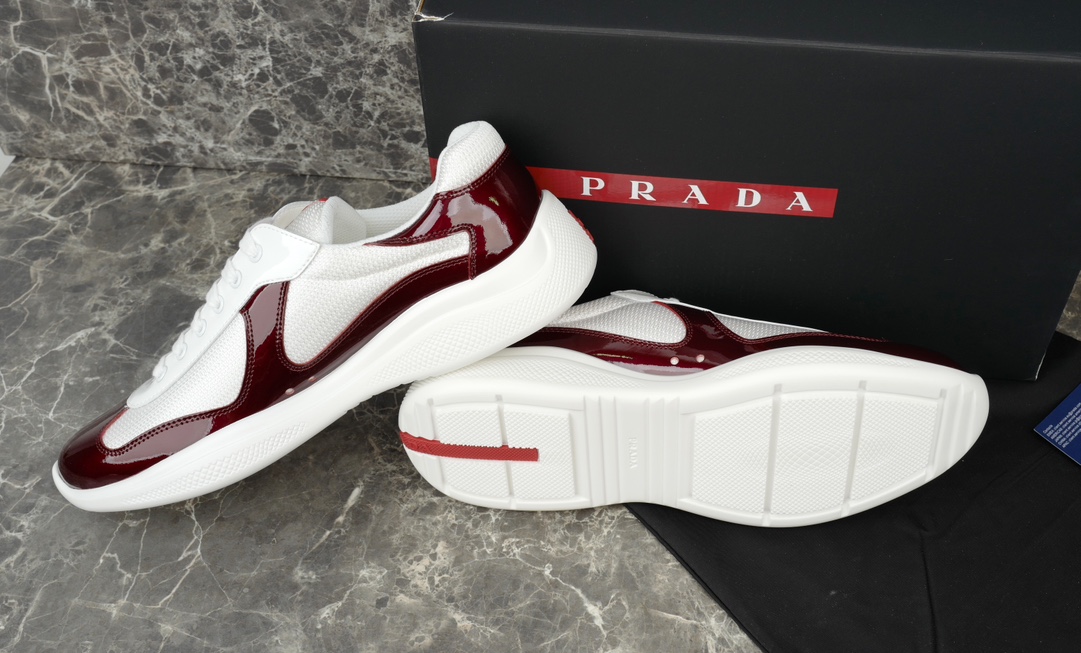 Prada America's Cup Leather-Trimmed Sneakers in Bordeaux/White 10 i1731219646 4283 6