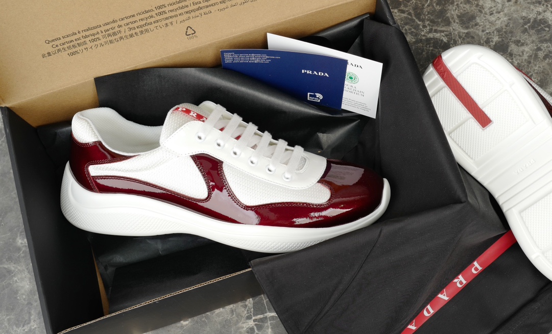 Prada America's Cup Leather-Trimmed Sneakers in Bordeaux/White 8 i1731219646 567 7