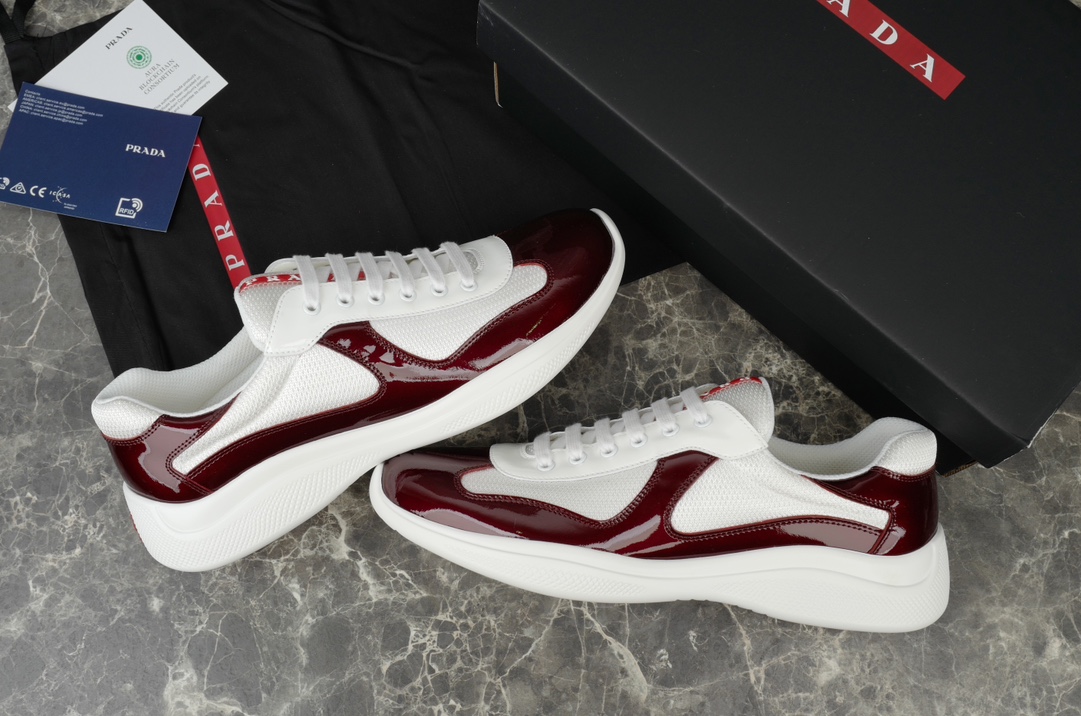 Prada America's Cup Leather-Trimmed Sneakers in Bordeaux/White 3 i1731219646 7040 8