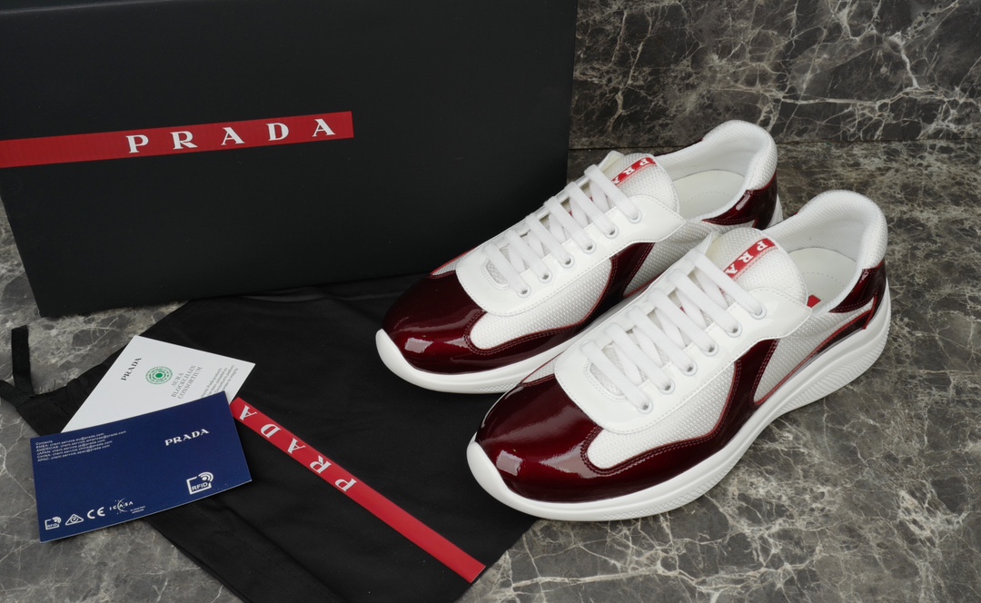 Prada America's Cup Leather-Trimmed Sneakers in Bordeaux/White 2 i1731219646 9166 2