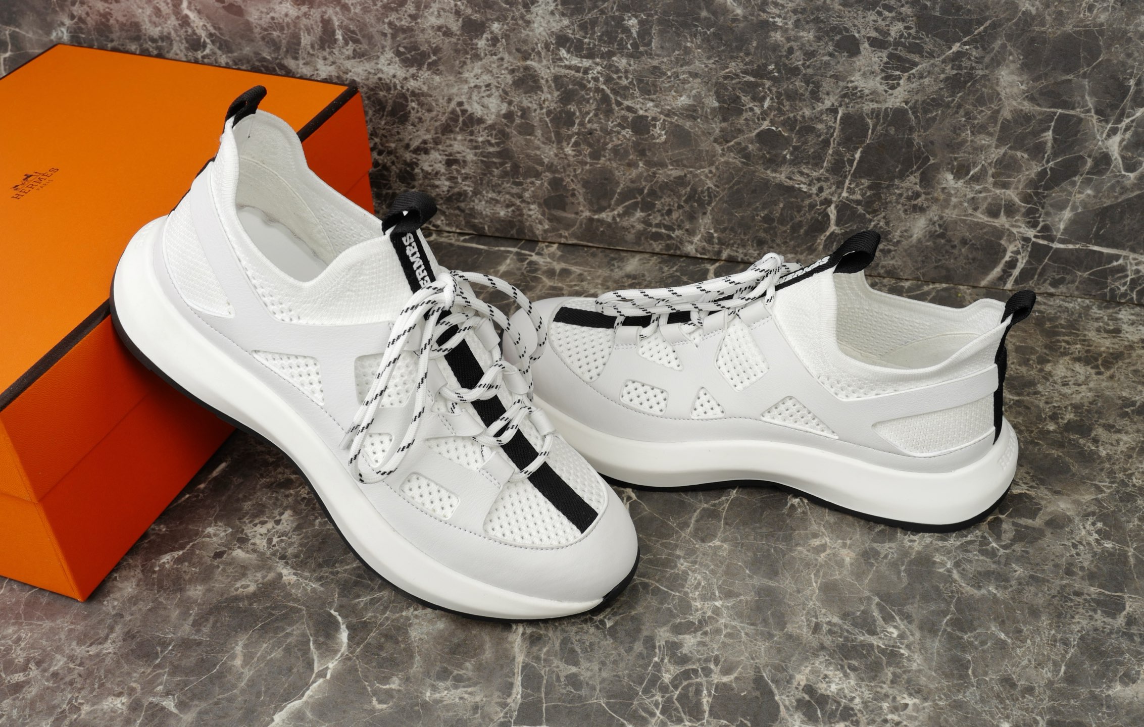 Hermes White Knit and Calfskin Sneakers with Geometric Openwork Details 9 i1743937974692 7236 0 7