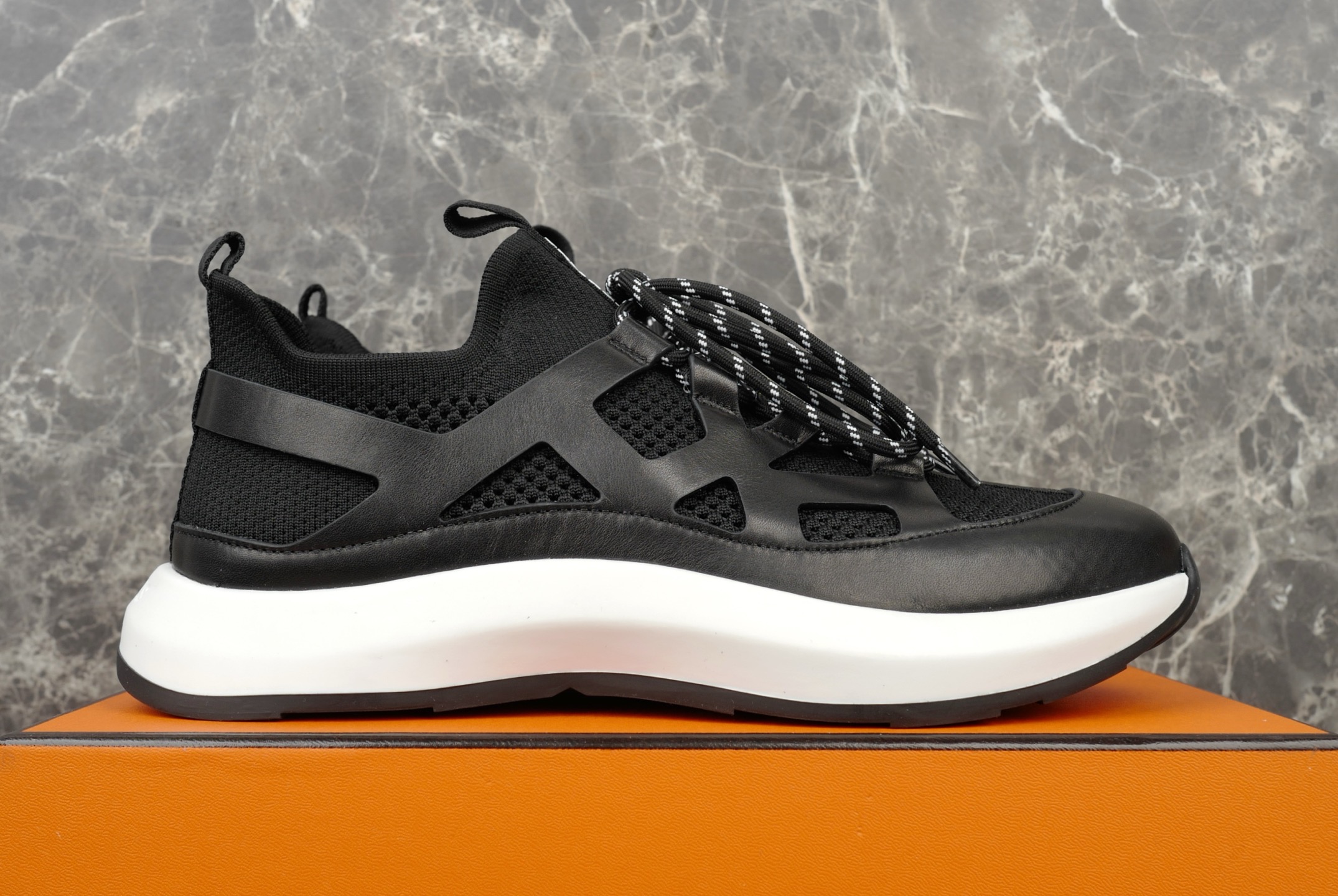 Hermes Knitted & Calfskin Sneakers with Geometric Openwork Details, Black 5 i1743938071627 2339 0 3