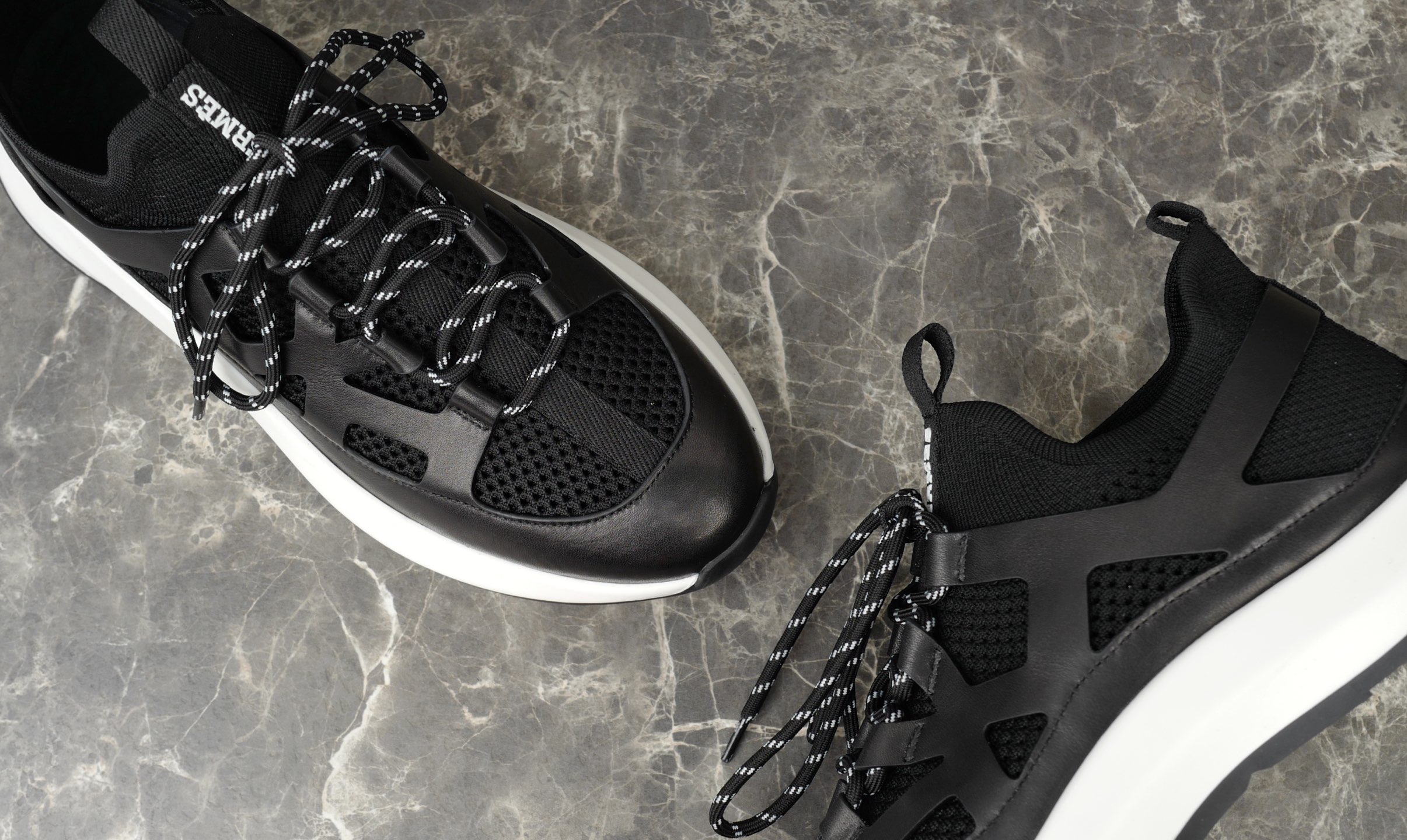 Hermes Knitted & Calfskin Sneakers with Geometric Openwork Details, Black 7 i1743938072313 4470 0 5