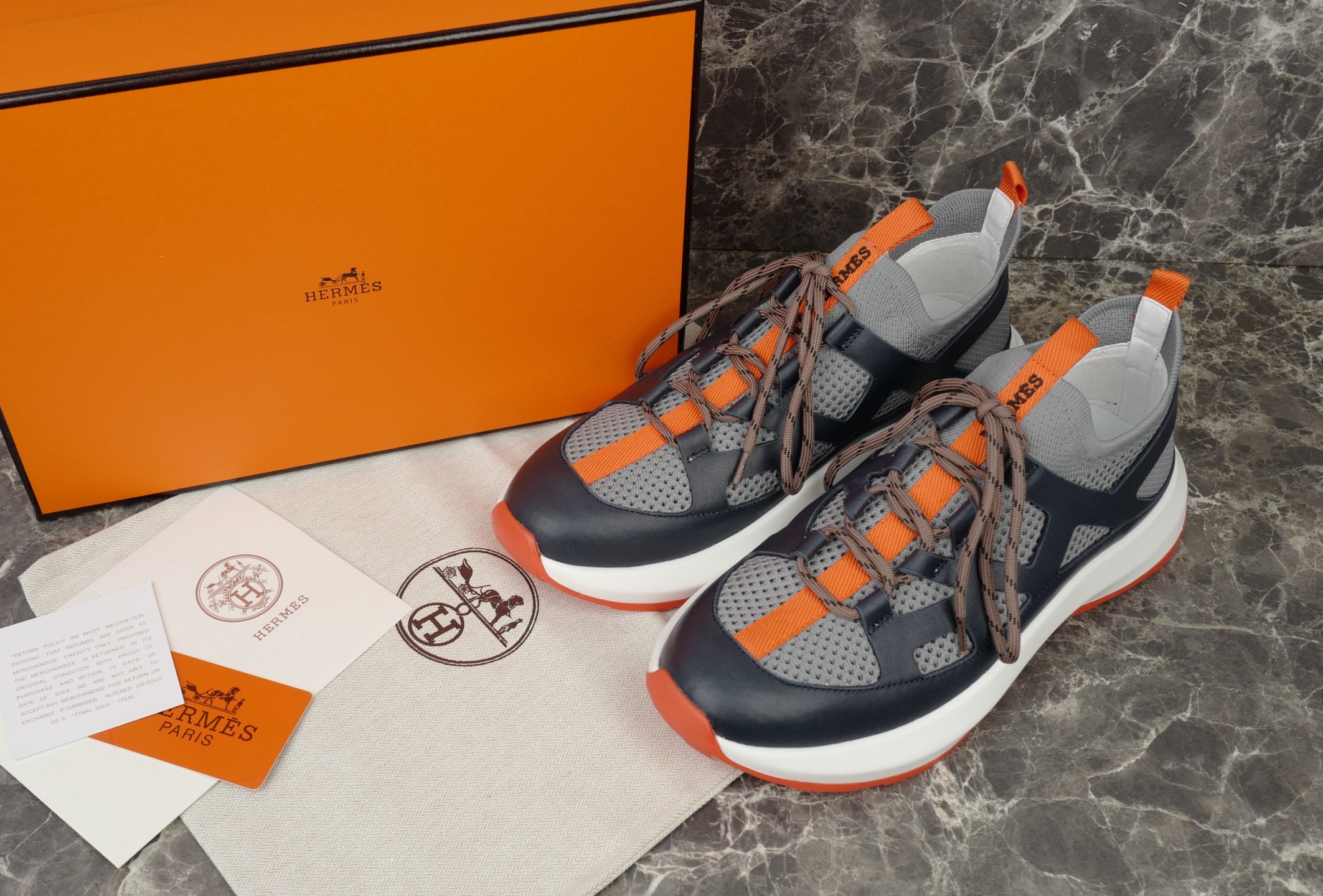 Hermes Knitted Calfskin Sneakers with Geometric Openwork Details - Modern Style 2 i1745237903454 8408 0 0