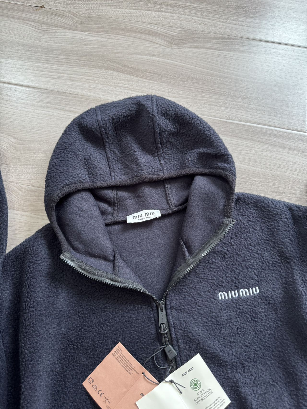 Miu Miu Fleece Zip-Up Hoodie Black - Cozy & Stylish Outerwear, Various Sizes 4 a1757569562884 8665