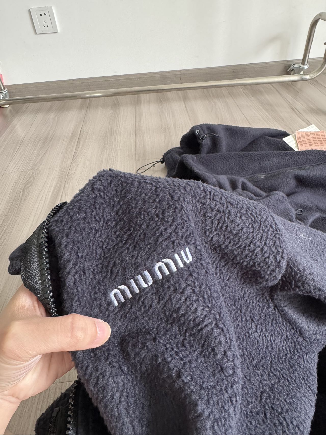 Miu Miu Fleece Zip-Up Hoodie Black - Cozy & Stylish Outerwear, Various Sizes 6 a1757569564051 6782
