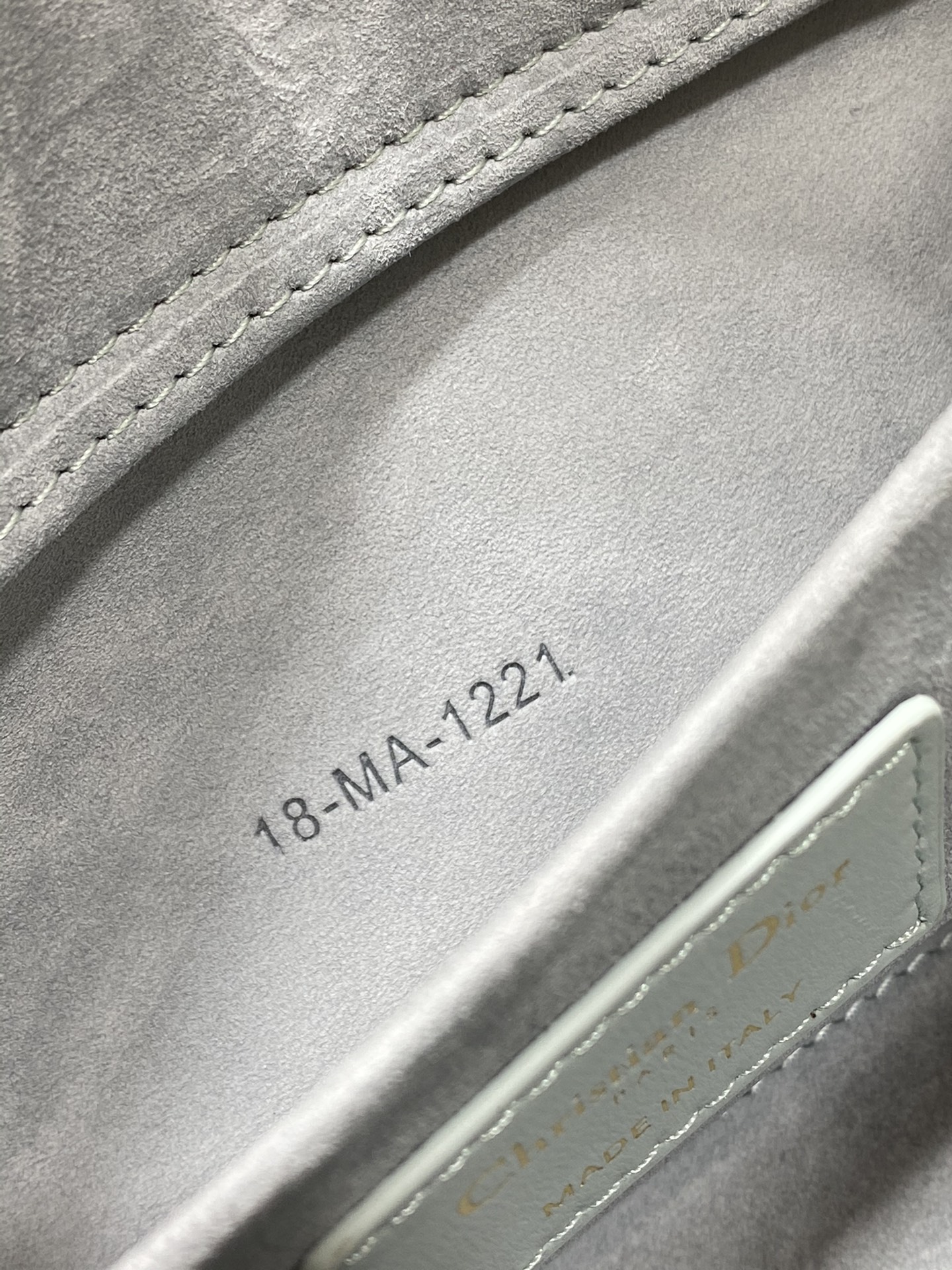The brand new D-joy bag, featuring a lake-blue leather lining and 9