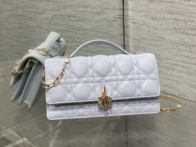 Elegant Ice Blue Quilted Leather Handbag with Pearl Chain and Letter Charm 1 Elegant Ice Blue Quilted Leather Handbag with Pearl Chain and Letter Charm