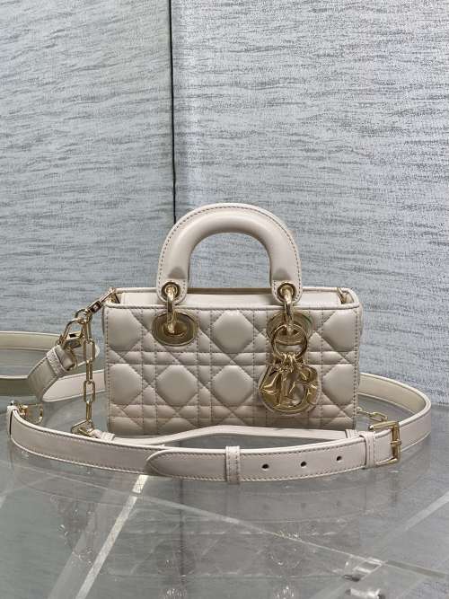 D-Joy Mini Bag: Elegant Quilted Lambskin, Versatile Crossbody & Top Handle 1 D-Joy Mini Bag: Elegant Quilted Lambskin, Versatile Crossbody & Top Handle