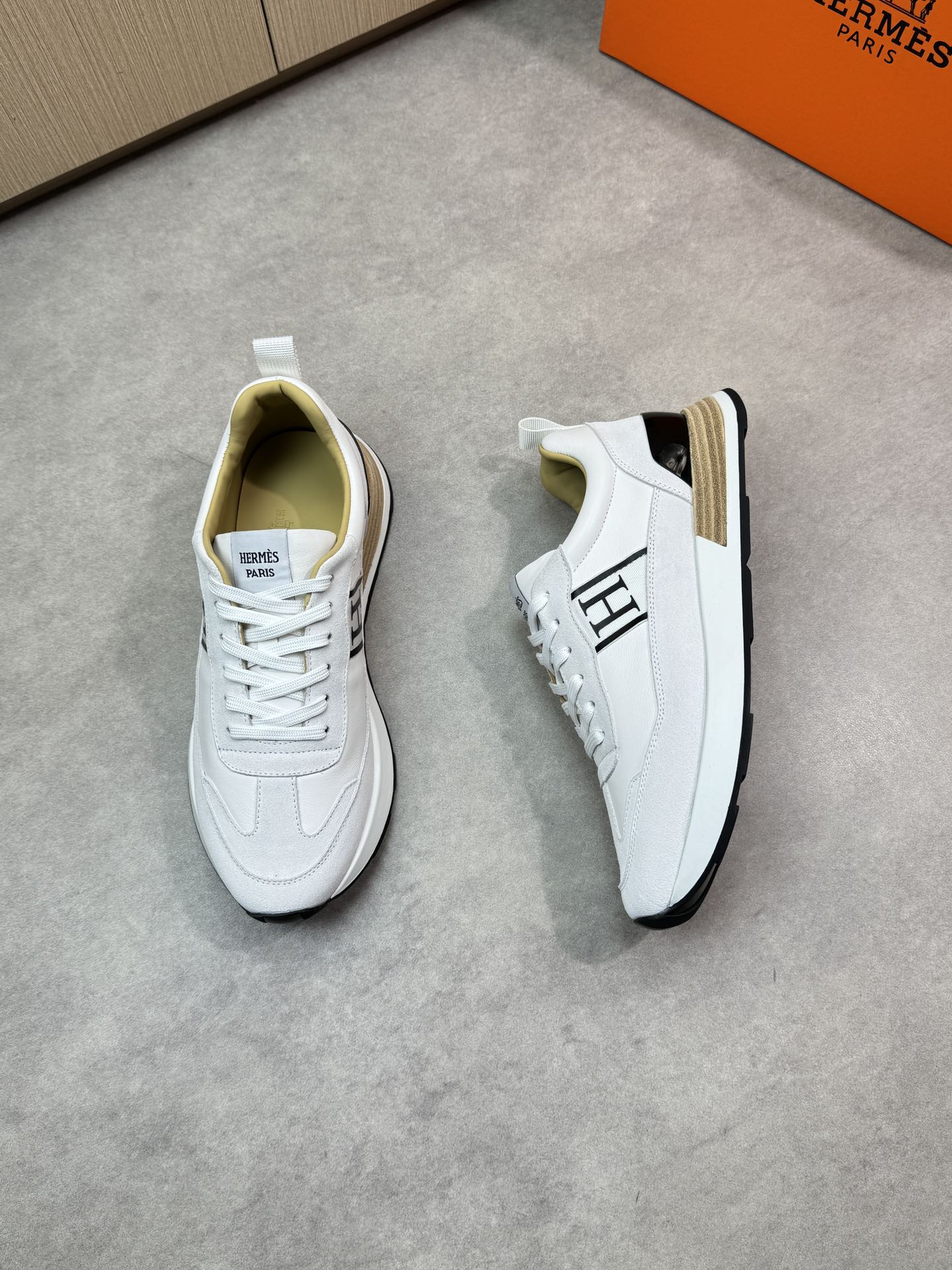 Hermès White Nappa Leather & Suede Sneakers with Logo Webbing 3 i1743183602 4679 1