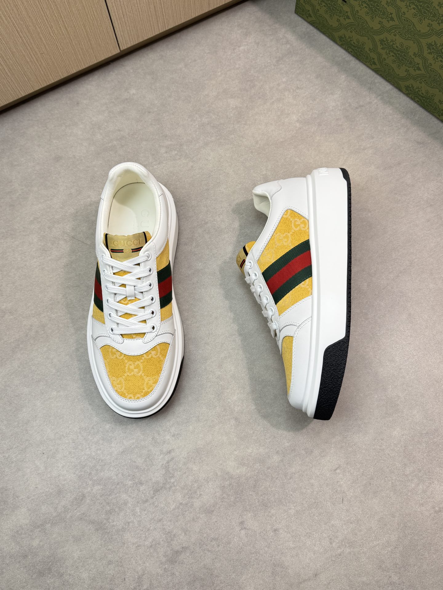 Gucci Men's Leather Sneaker with Web stripe and gold Gucci print 3 i1743355748 1807 1