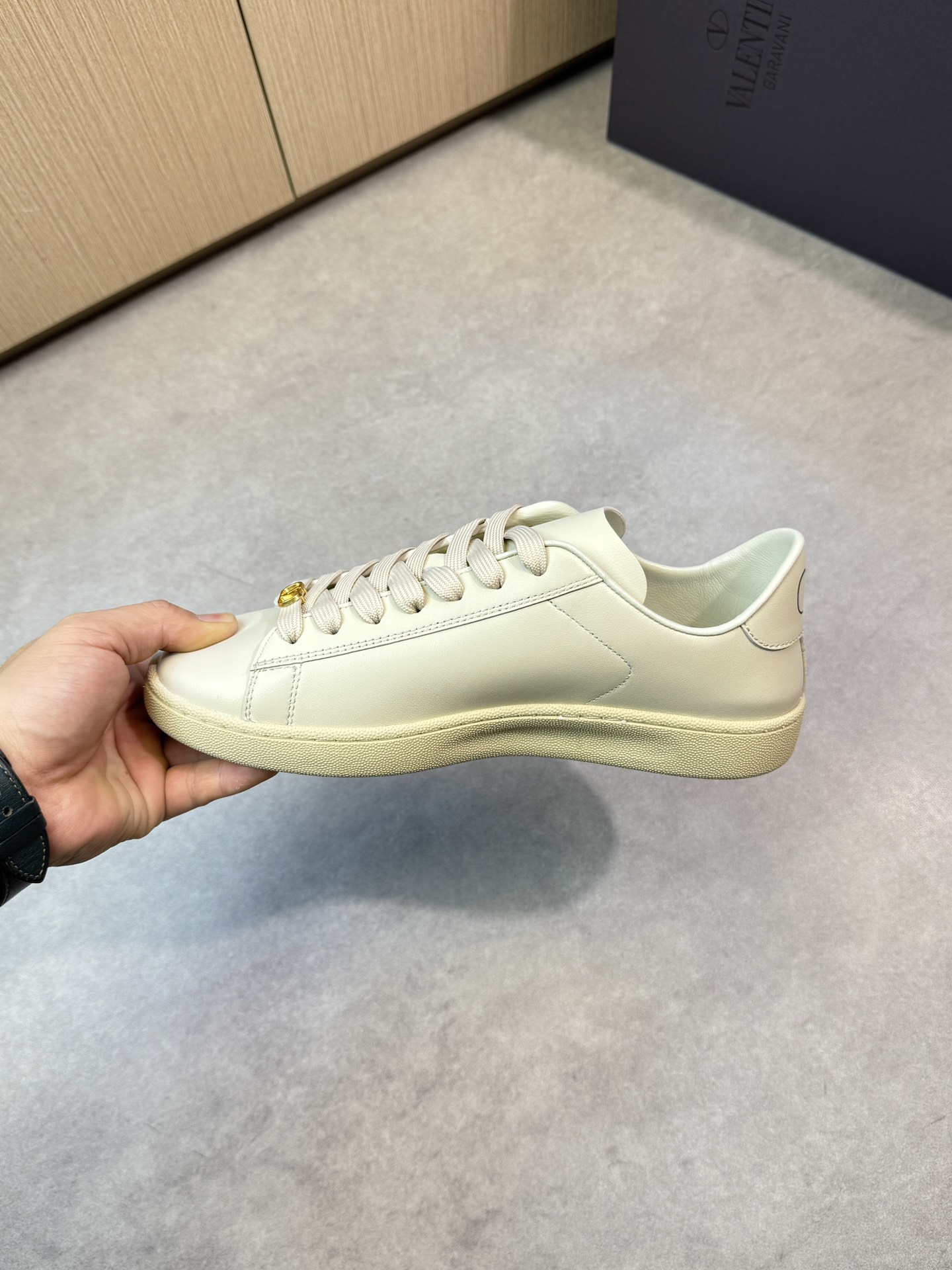 Valentino Garavani Leather Sneakers with Metal Logo - Premium Quality 6 i1744133264 6253 4