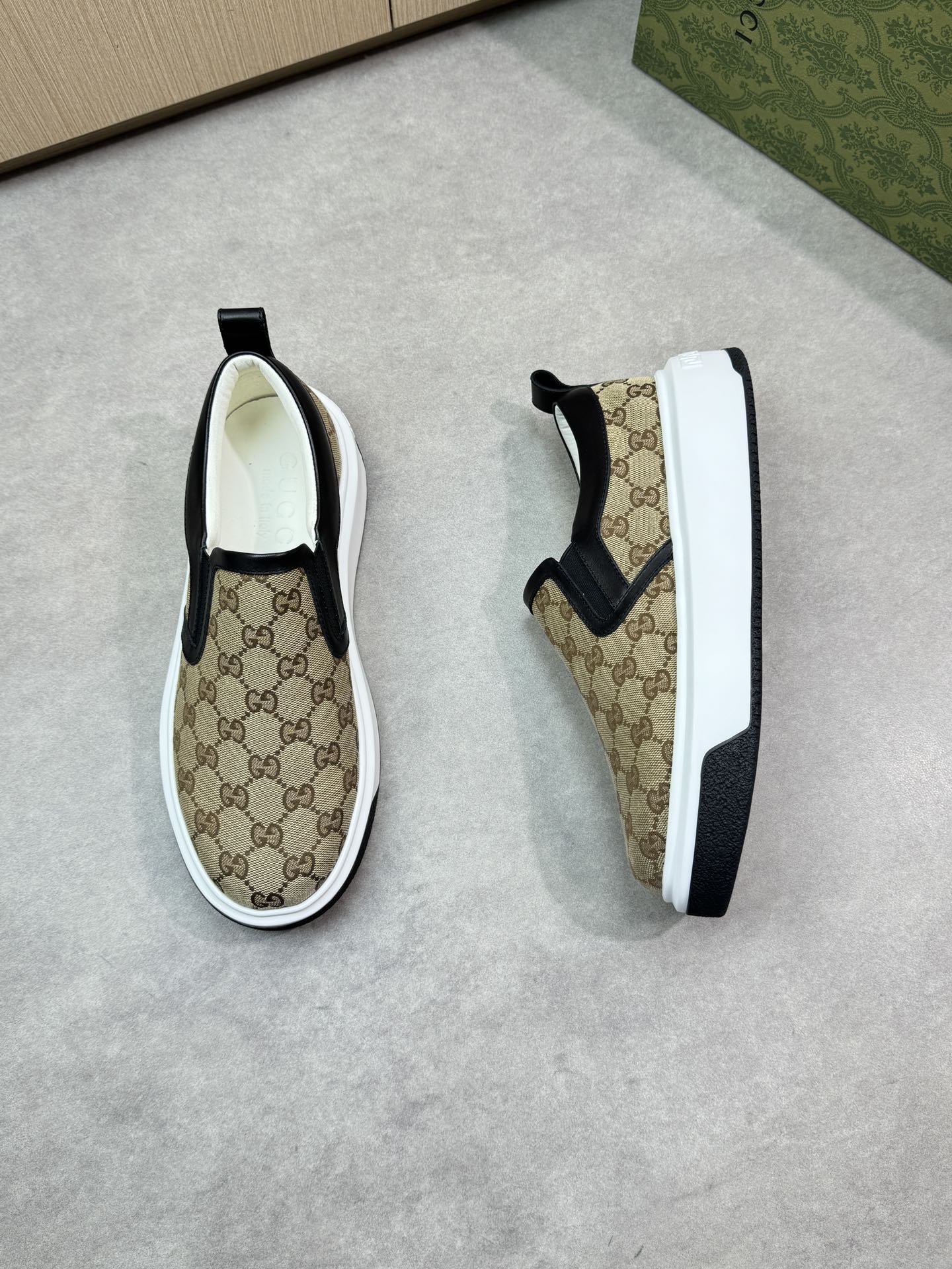 Gucci Slip-On Sneakers in Signature GG Canvas with Leather Trim 3 i1744737538 8308 1