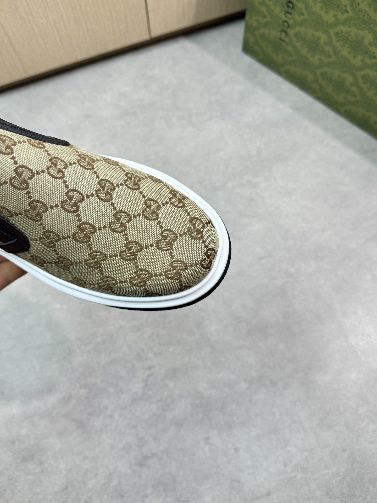 Gucci Slip-On Sneakers in Signature GG Canvas with Leather Trim 7 i1744737538 9910 5