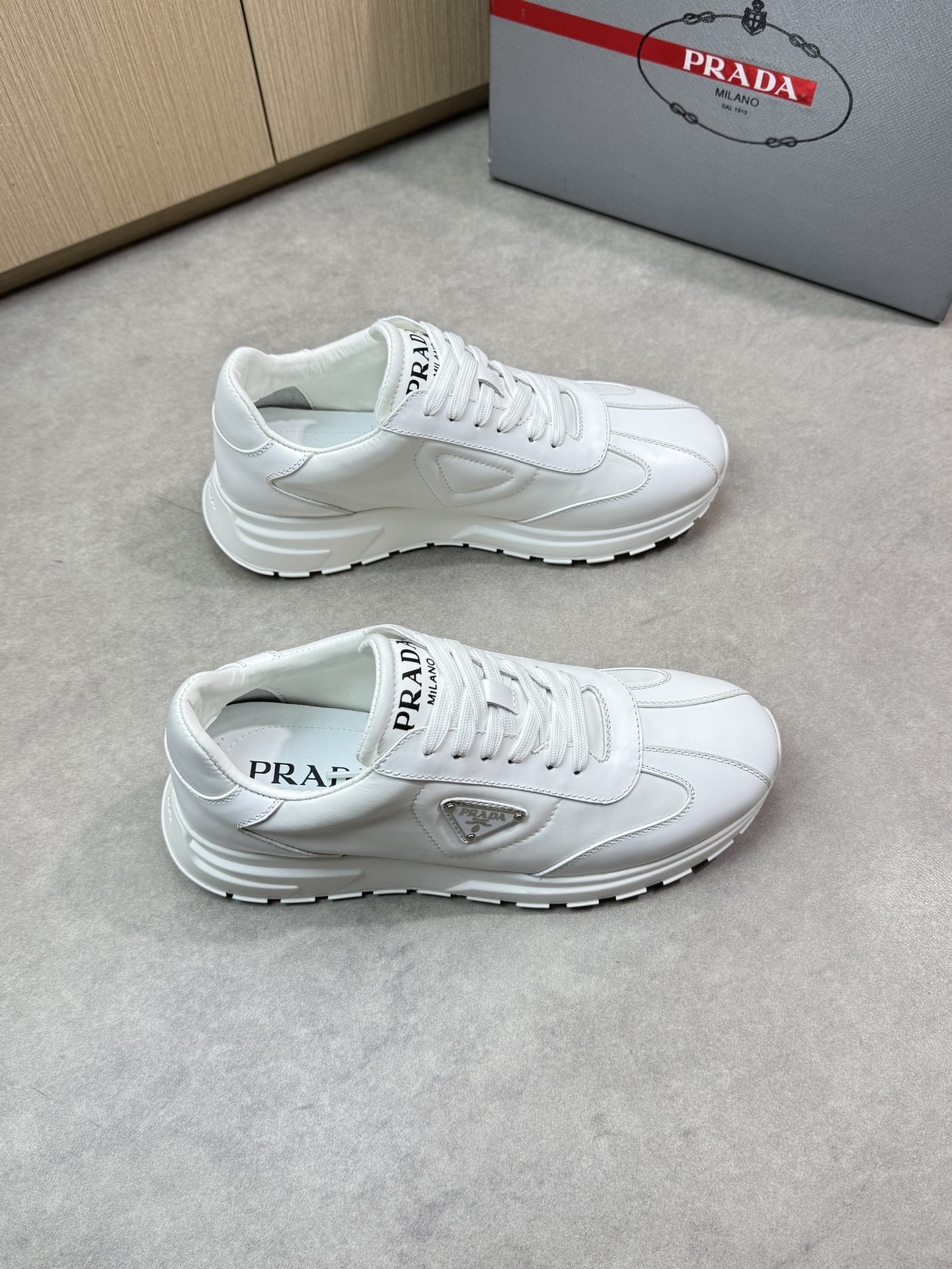 Prada White Nappa Leather Casual Sneakers with Metal Buckle, PR0121 1 Prada White Nappa Leather Casual Sneakers with Metal Buckle, PR0121