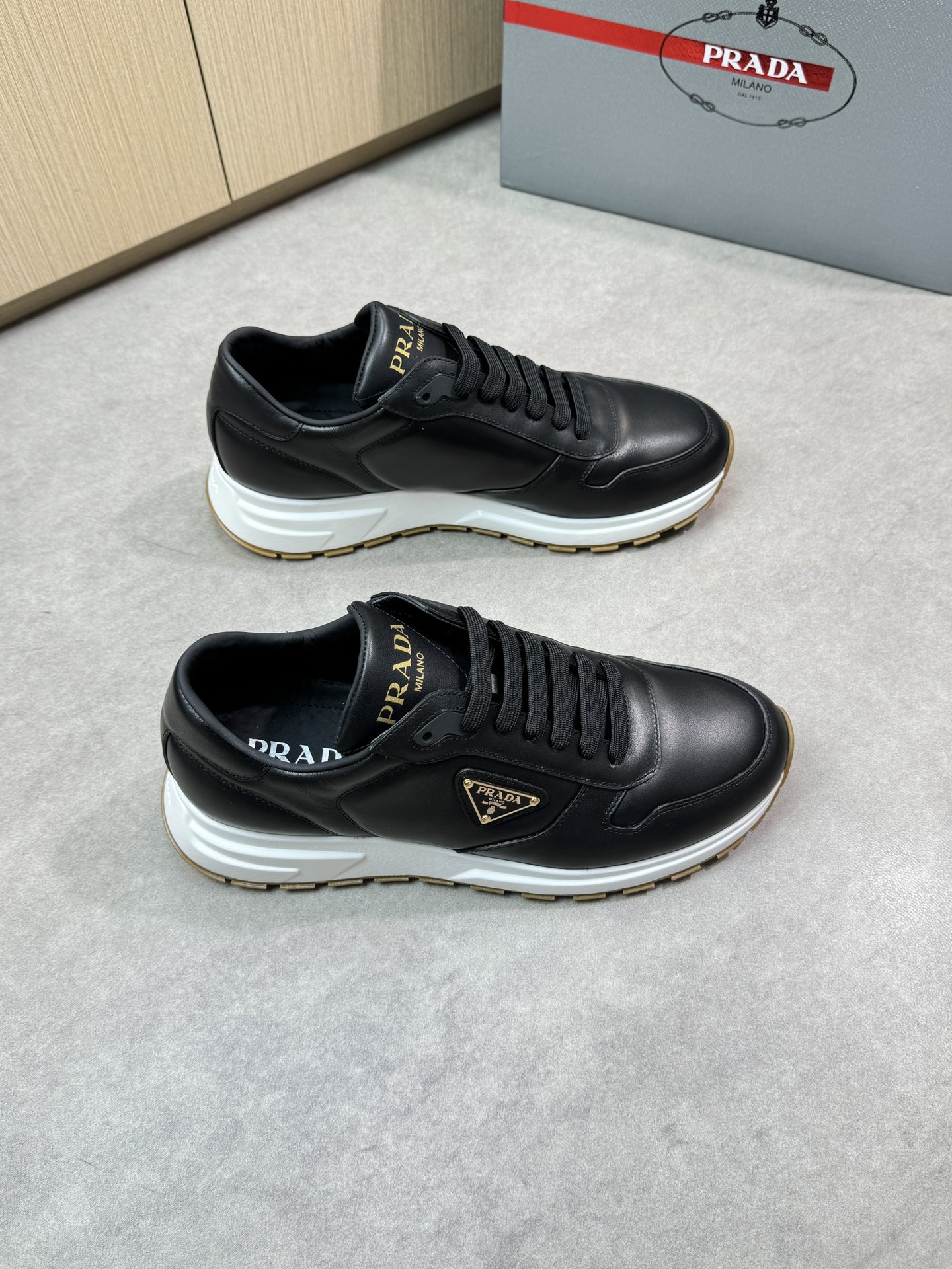 Prada Black Leather Sneakers with Logo Detail - Premium Quality & Comfort 2 i1744825082 3580 0