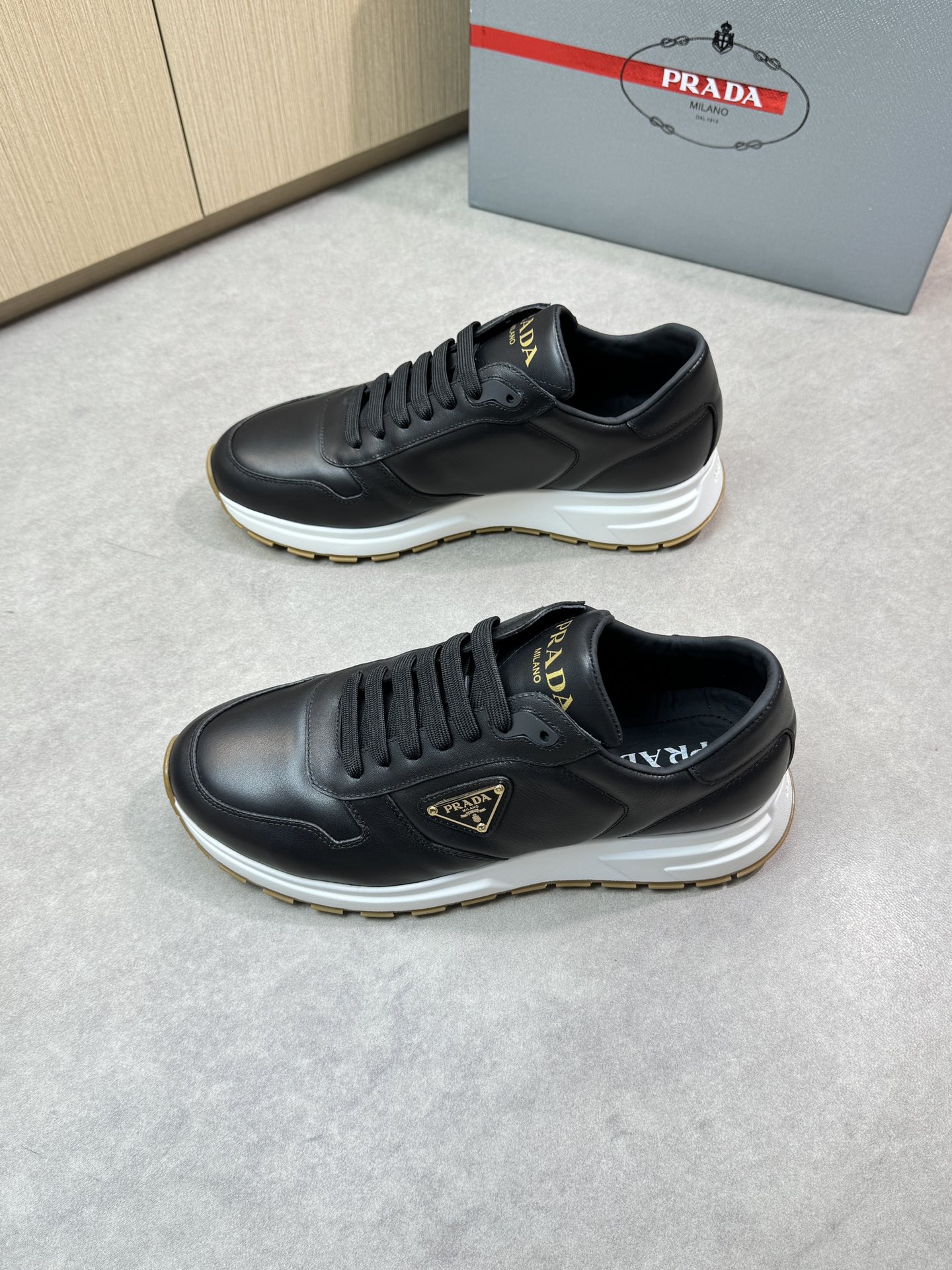 Prada Black Leather Sneakers with Logo Detail - Premium Quality & Comfort 4 i1744825082 5017 2