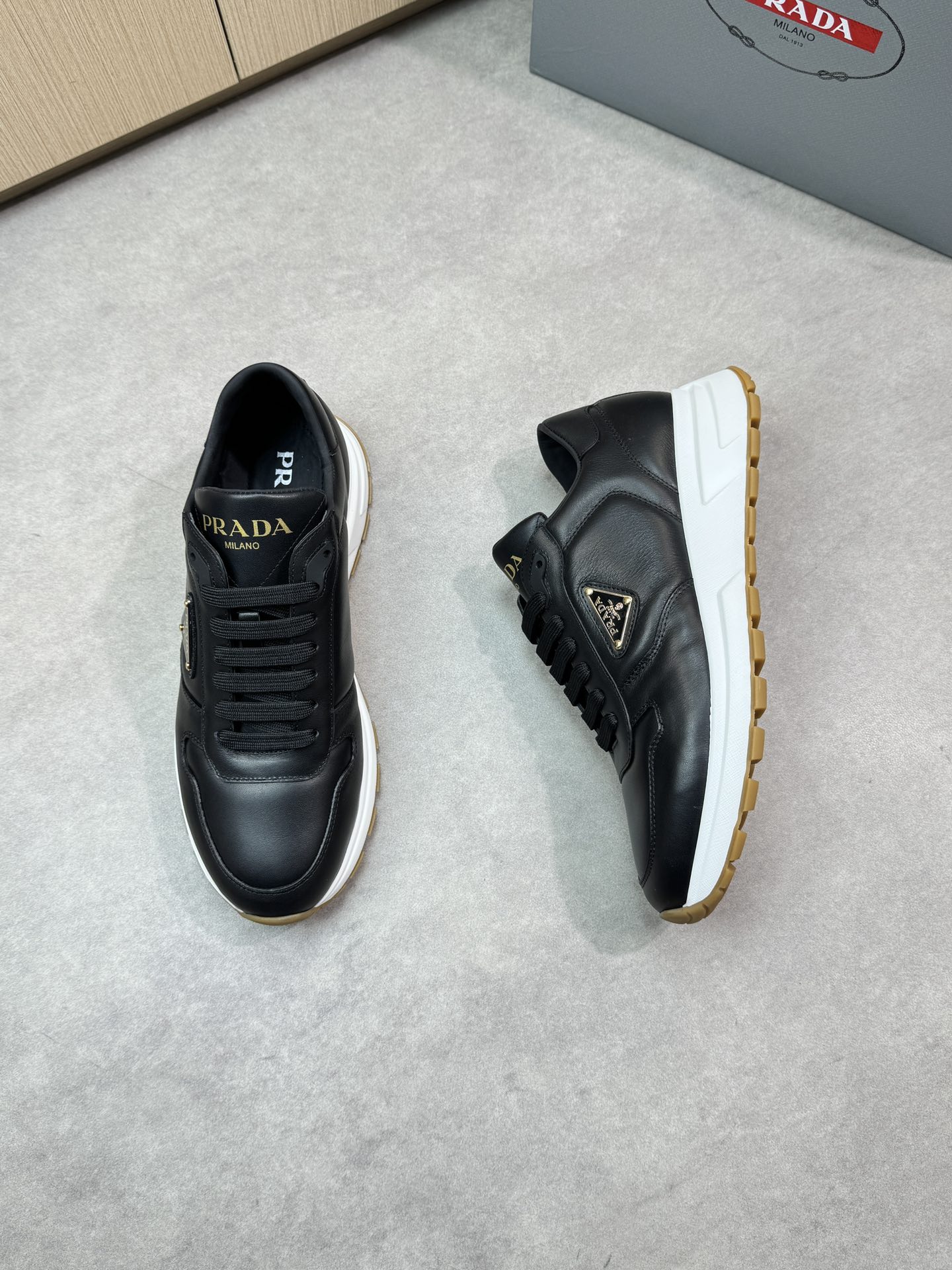 Prada Black Leather Sneakers with Logo Detail - Premium Quality & Comfort 3 i1744825082 8747 1
