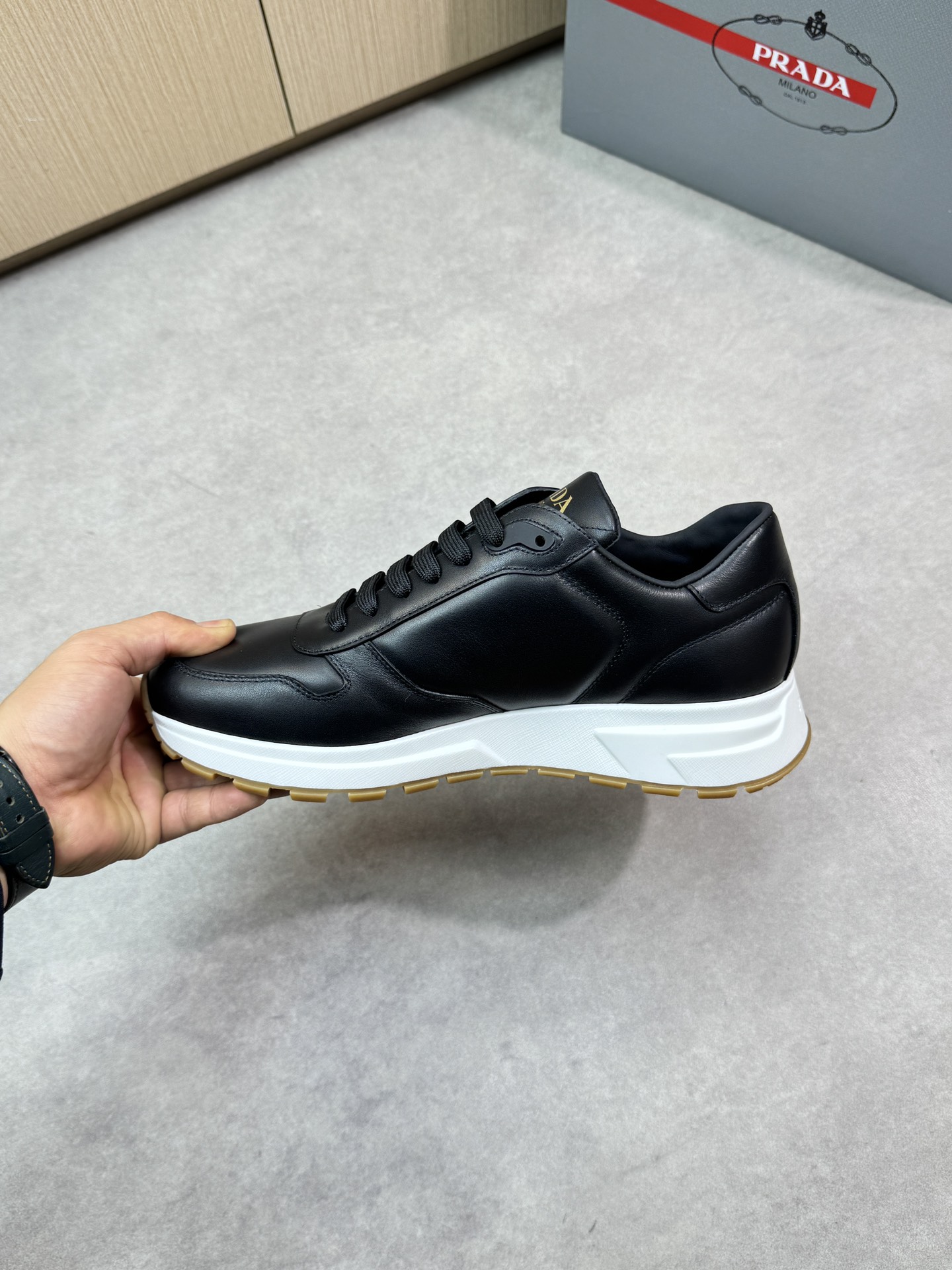 Prada Black Leather Sneakers with Logo Detail - Premium Quality & Comfort 6 i1744825082 8909 4