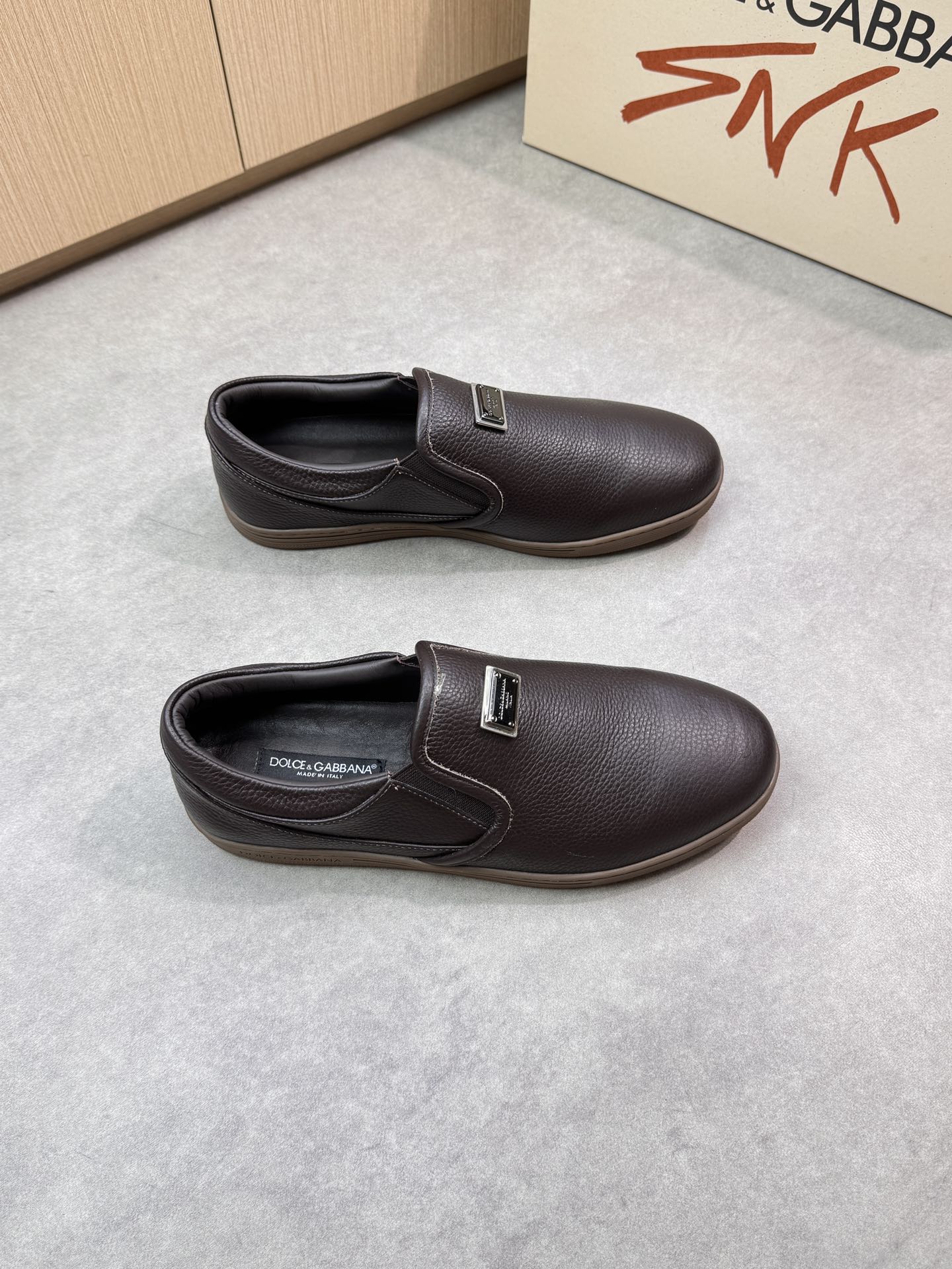 Dolce & Gabbana Leather Slip-On Sneakers With Metal Logo Accent 1 Dolce & Gabbana Leather Slip-On Sneakers With Metal Logo Accent