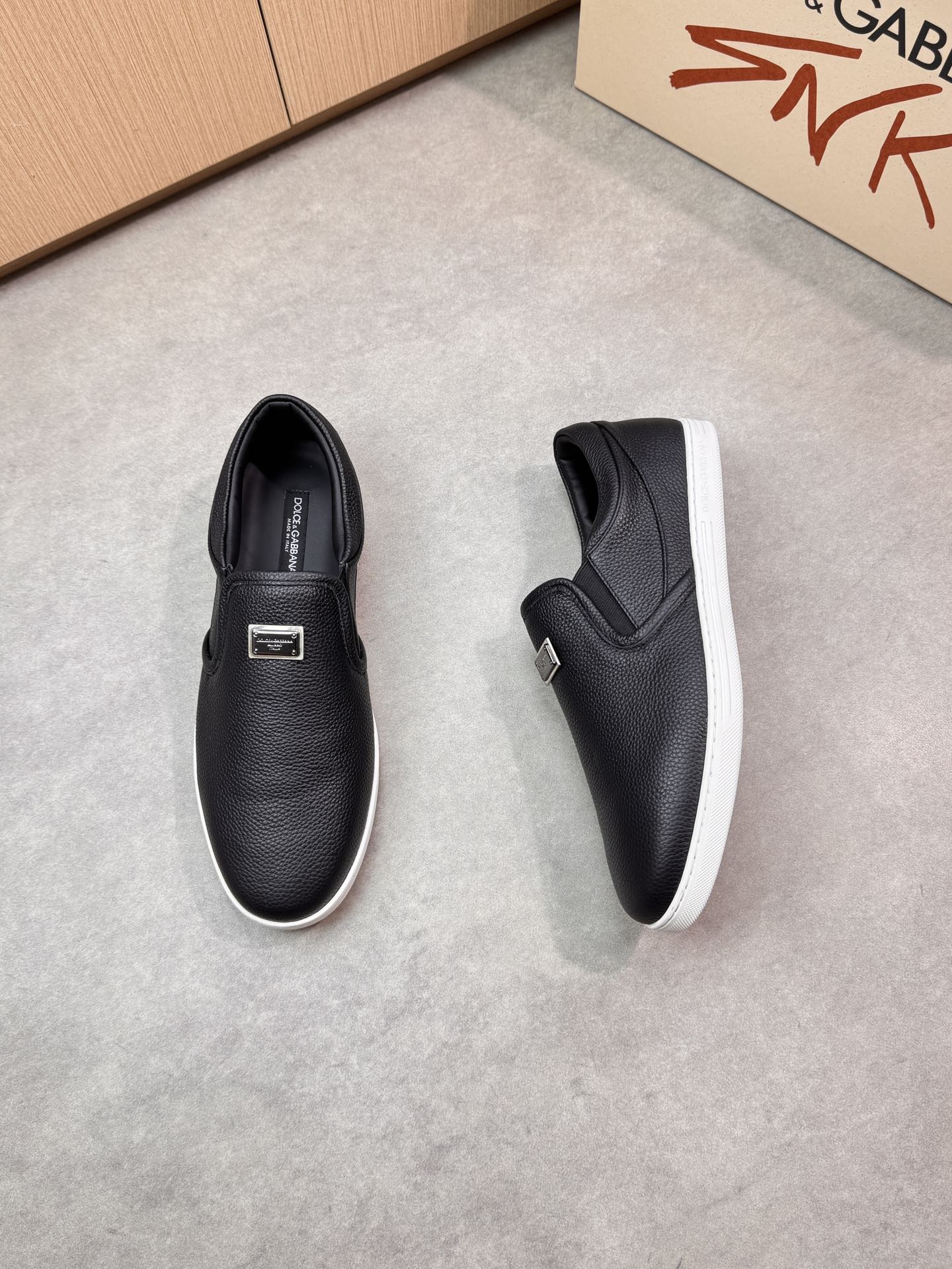 Dolce & Gabbana Leather Slip-On Sneakers with Metal Logo Accent 3 i1746551044 5121 1
