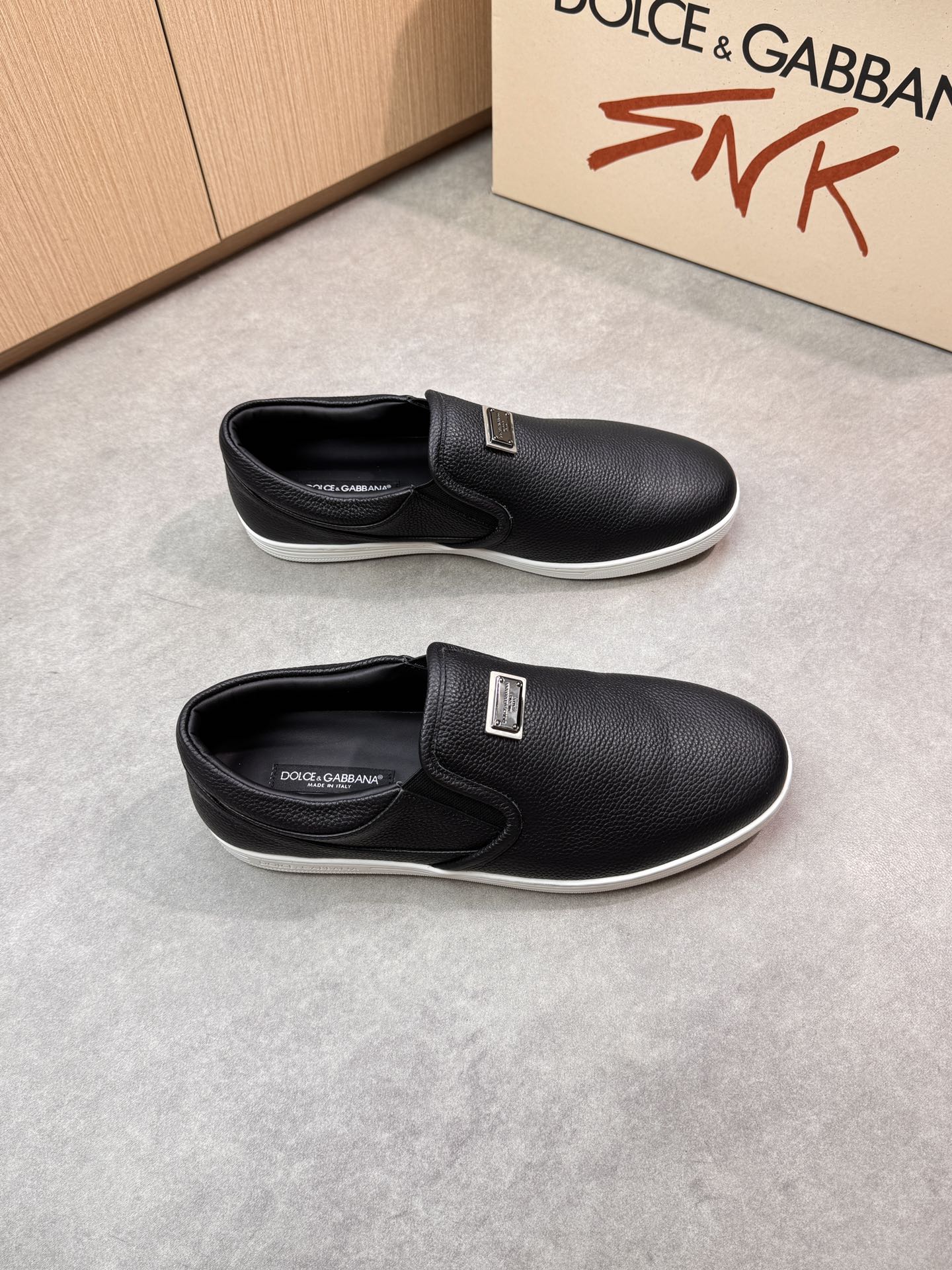Dolce & Gabbana Leather Slip-On Sneakers with Metal Logo Accent 2 i1746551044 7196 0