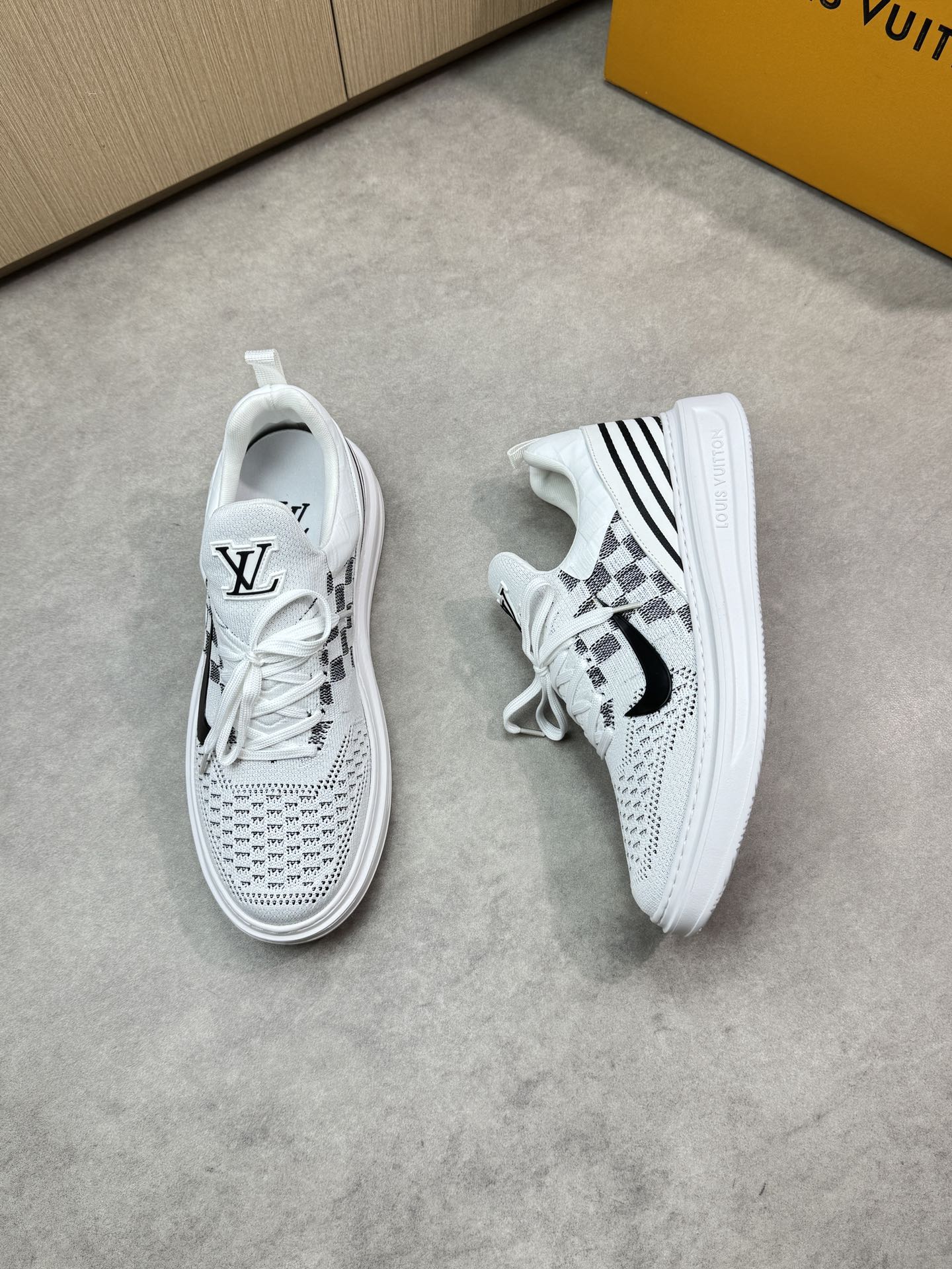 Louis Vuitton White Knit Sneakers with TPU Sole and Designer Accents 3 i1746726857 1372 1