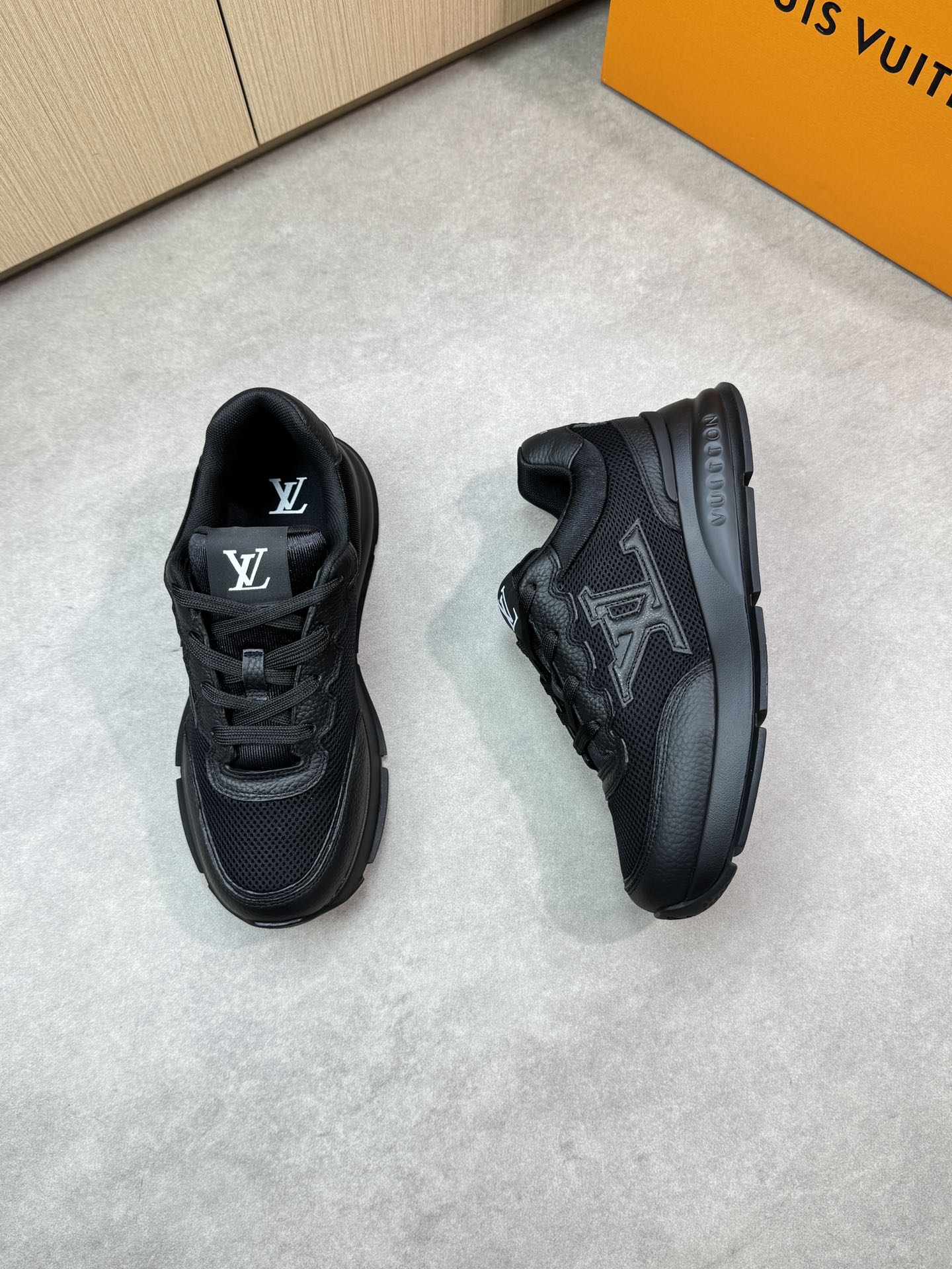 Louis Vuitton Men's and Women's Casual Sneakers in Black Leather 2 i1748538943 4754 1
