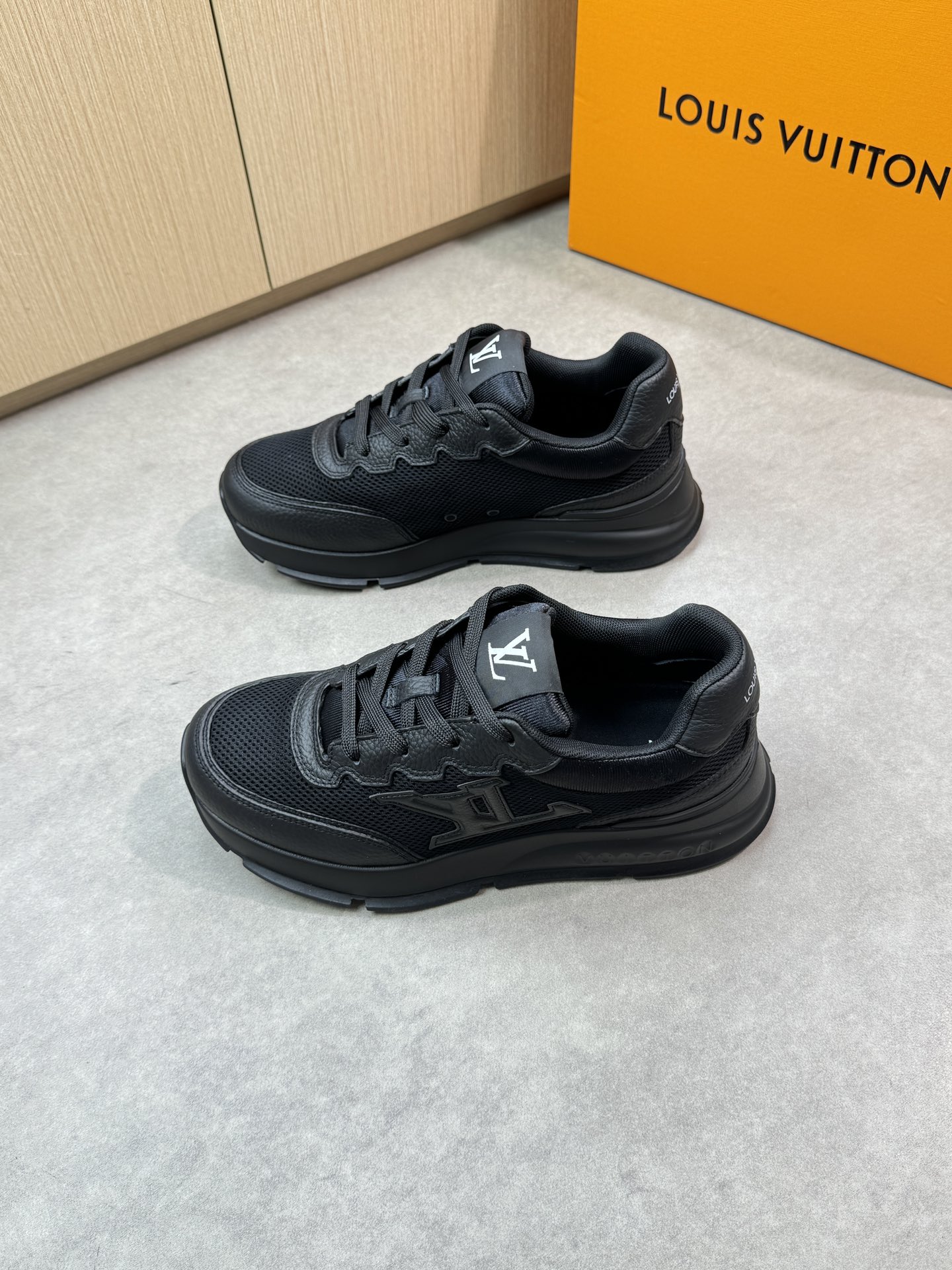 Louis Vuitton Men's and Women's Casual Sneakers in Black Leather 3 i1748538943 688 2