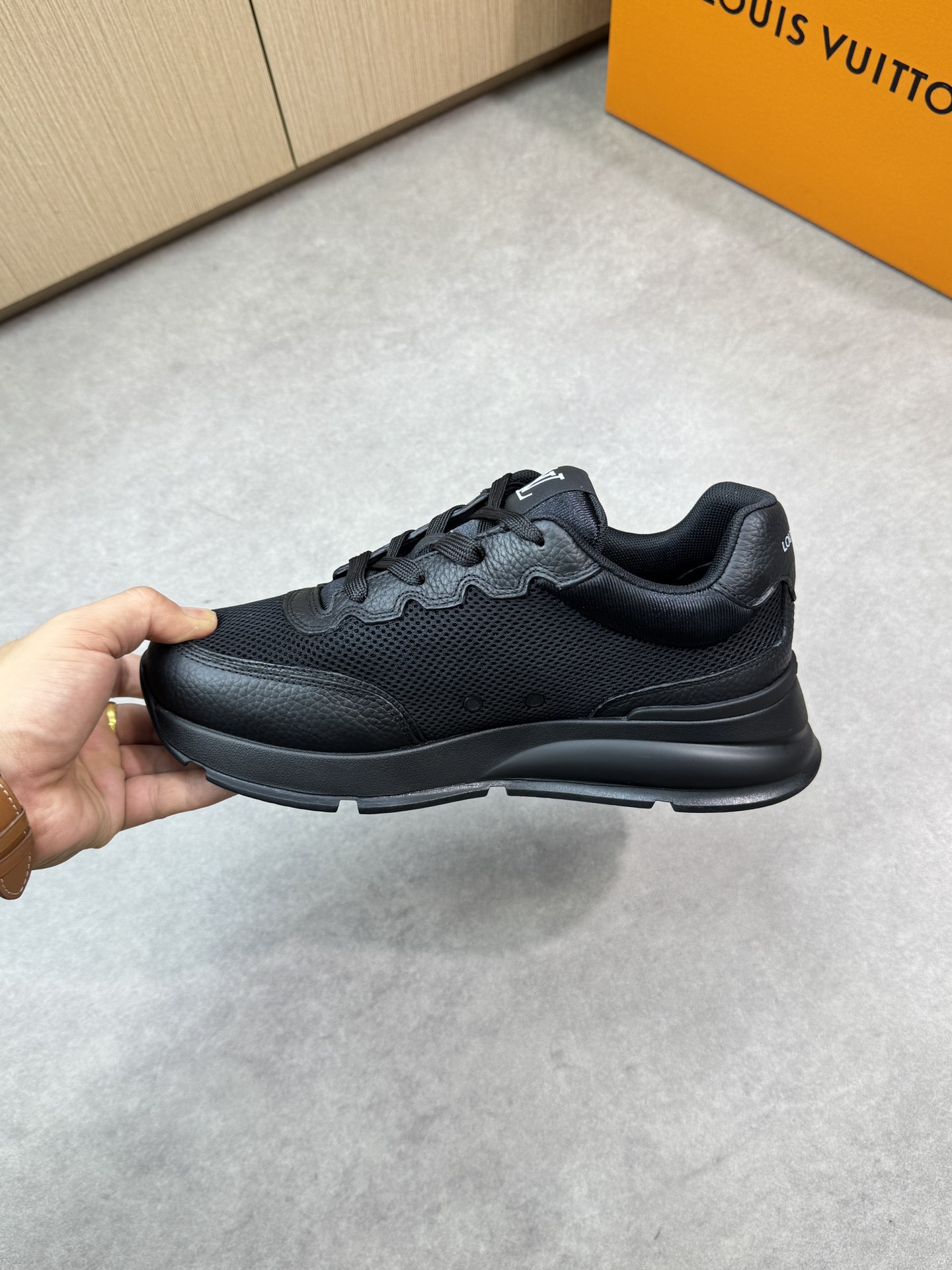 Louis Vuitton Men's and Women's Casual Sneakers in Black Leather 5 i1748538943 7345 4