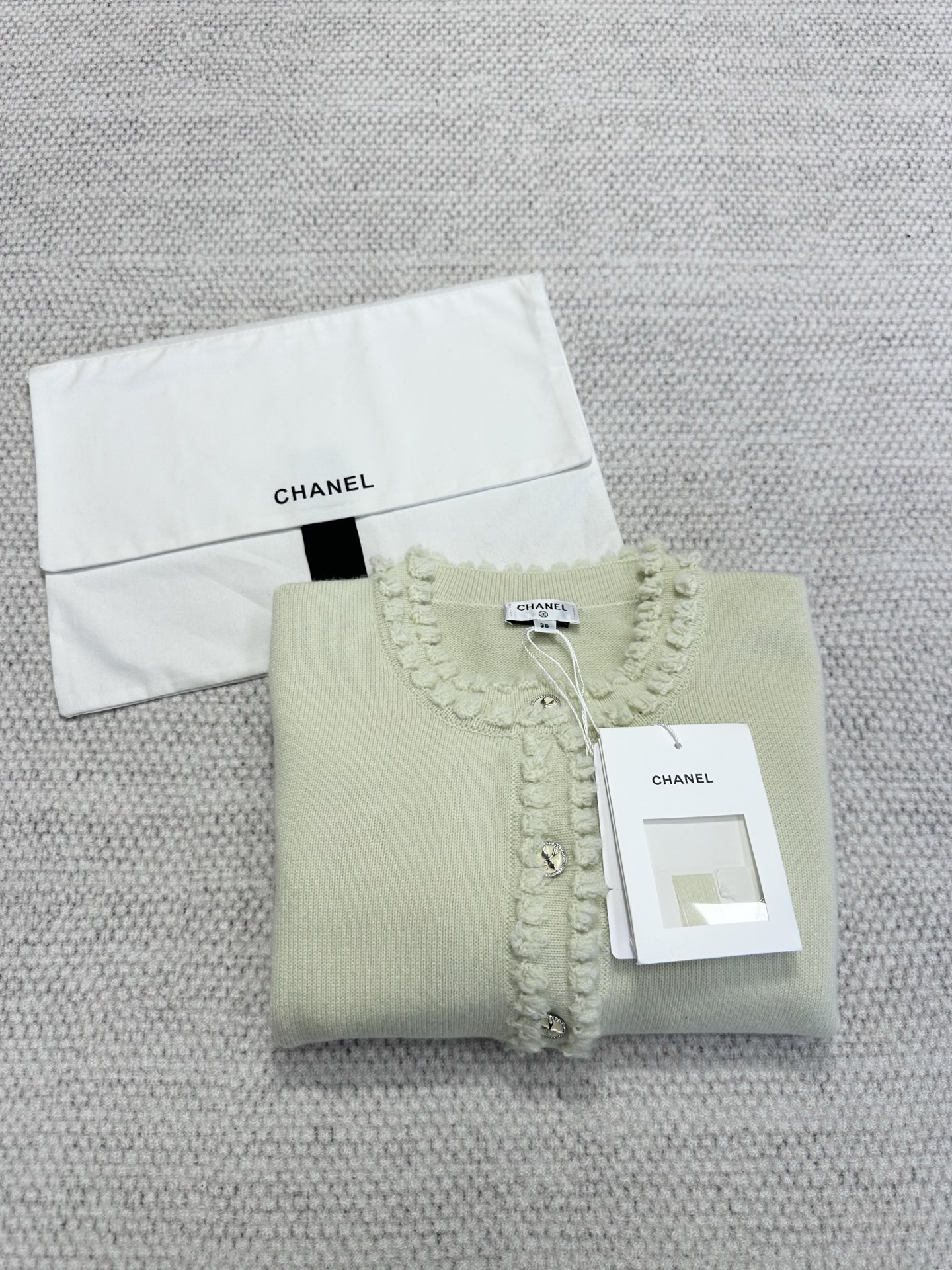 Chanel Cashmere Knit Cardigan with Ruffle Trim and Decorative Buttons 4 i1749459102174 4125 0 2