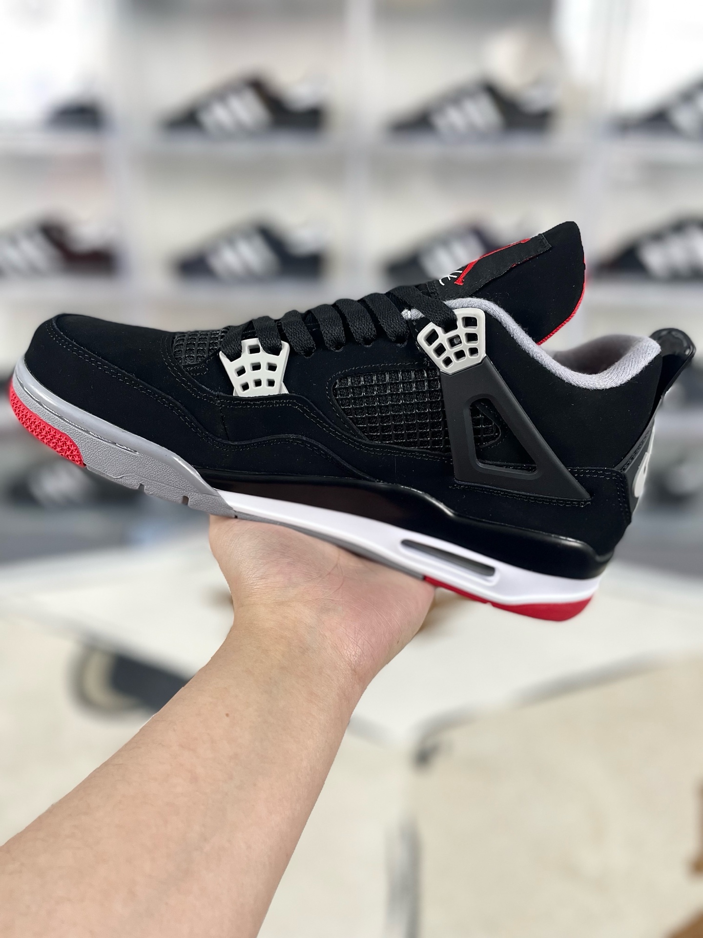 Air Jordan 4 Retro Bred: Iconic Style, Superior Comfort, and Timeless Design 2 i1736629431651 8795 0 1