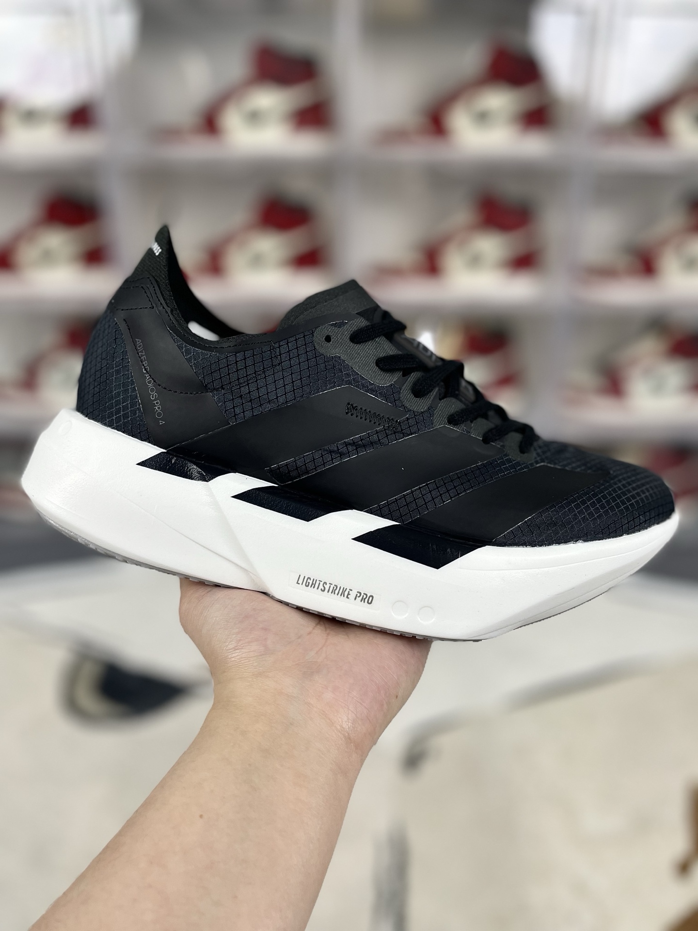 Adidas Adizero Adios Pro 4: Comfort, Slip-Resistant, and Durable Running Shoes