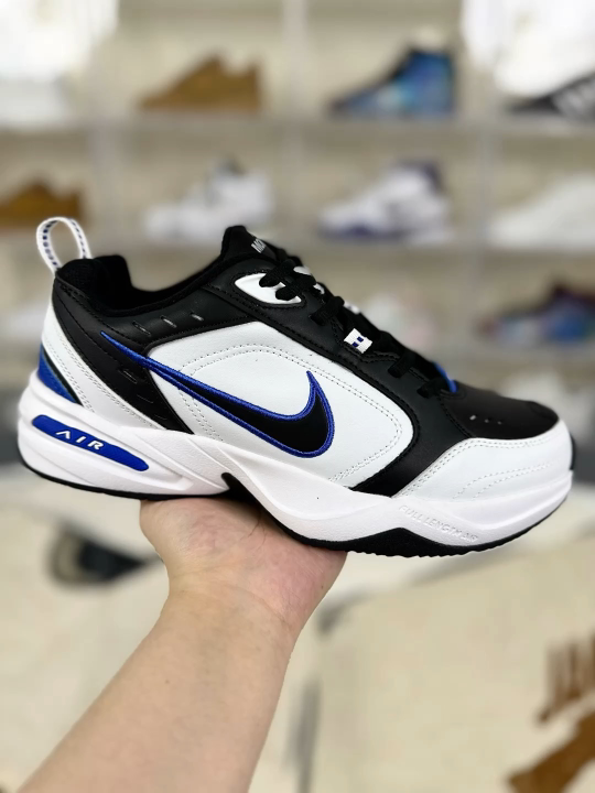 Nike Air Monarch IV: Leather Comfort, Low-Top Design, Black White Blue Sneakers