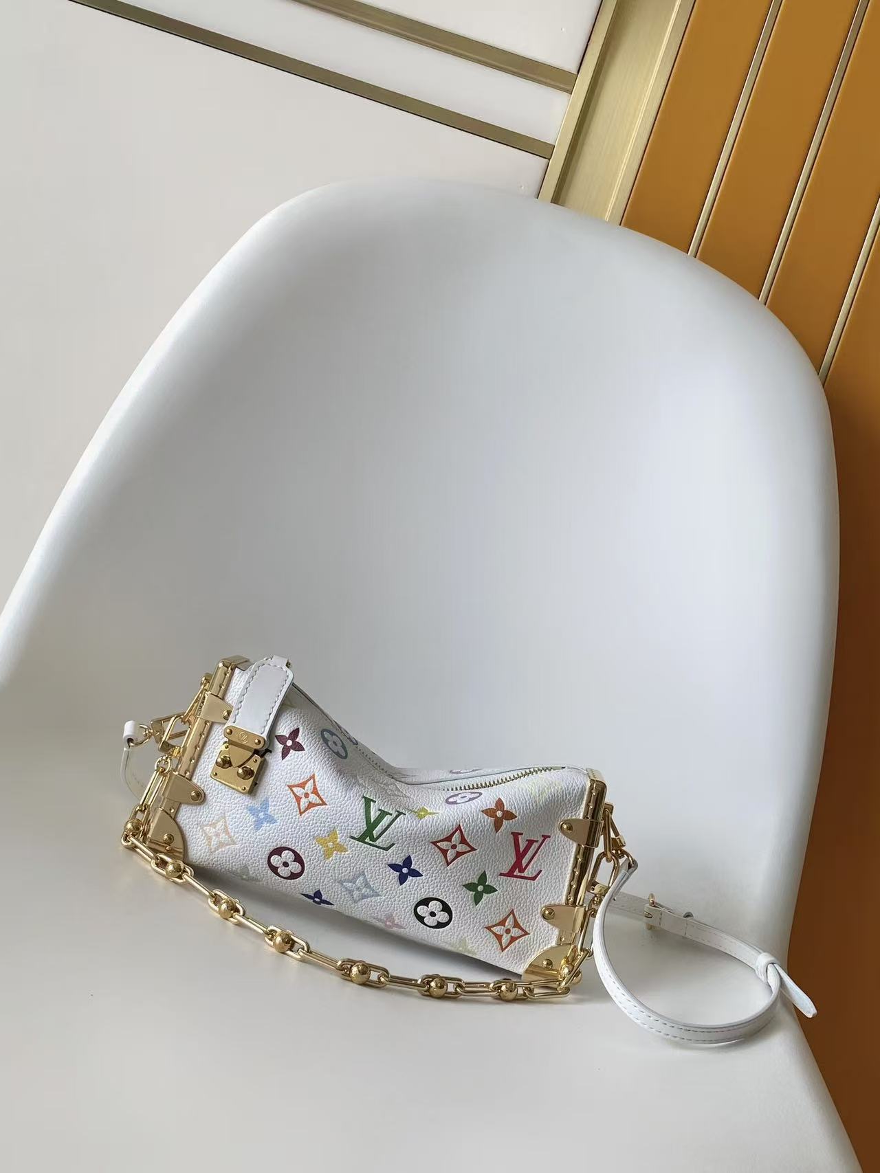 LV Soft trunk-inspired handbag with chain strap