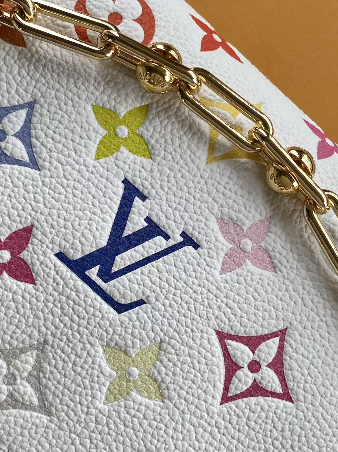 LV Soft trunk-inspired handbag with chain strap