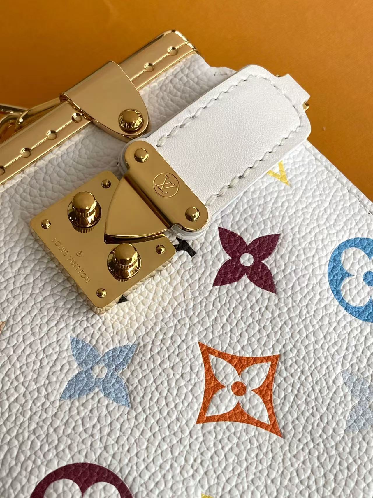 LV Soft trunk-inspired handbag with chain strap